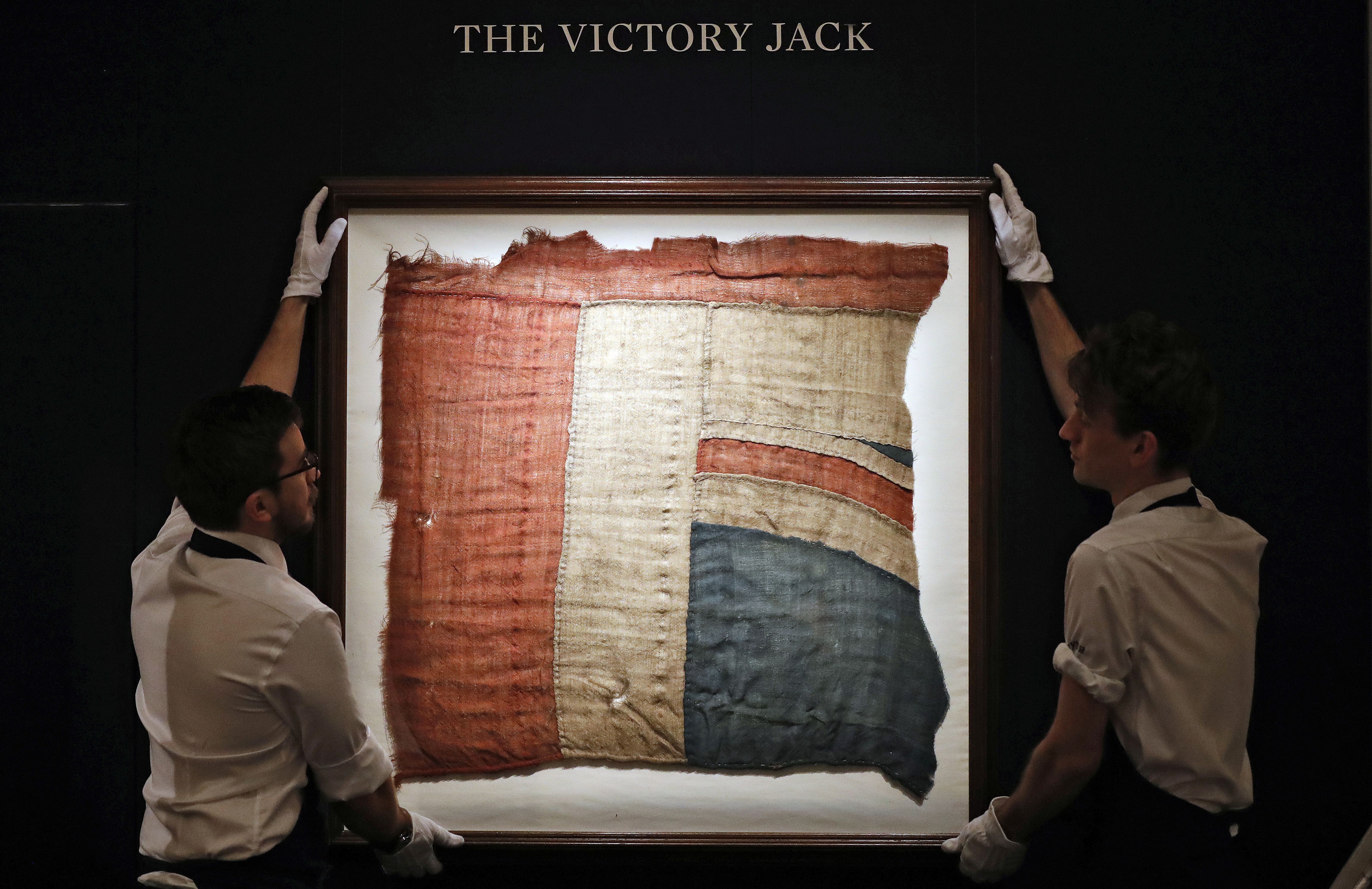 Scrap of flag from Nelson's HMS Victory sells for $408,000