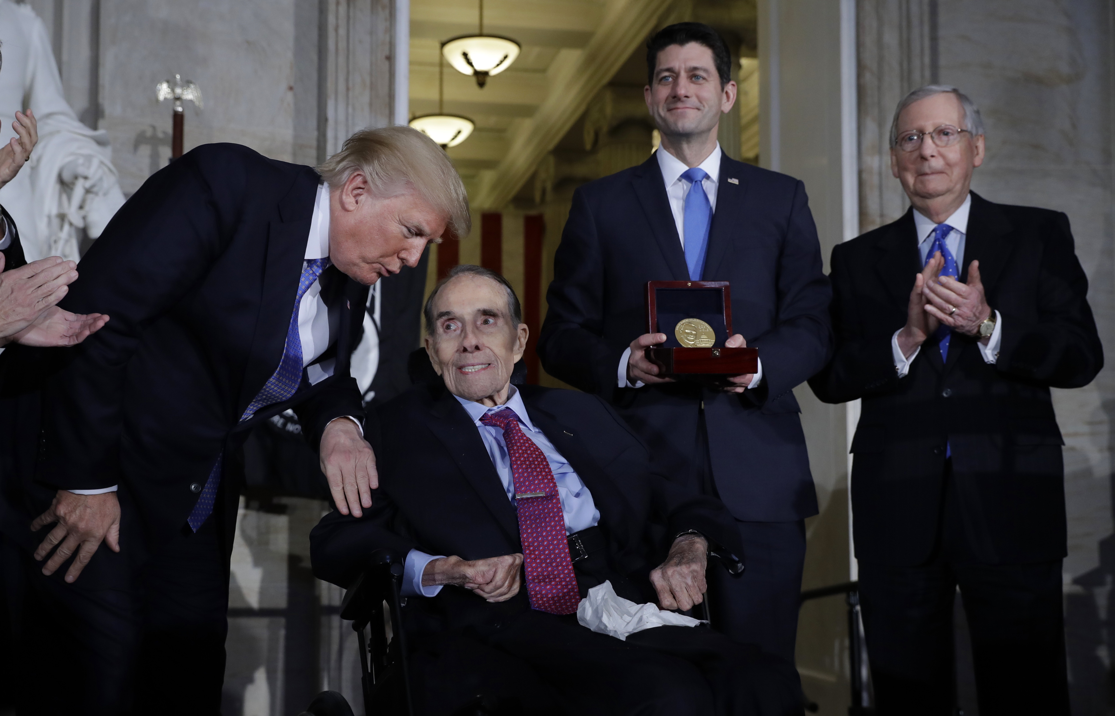 The Latest: Trump calls Bob Dole 'a true American hero'