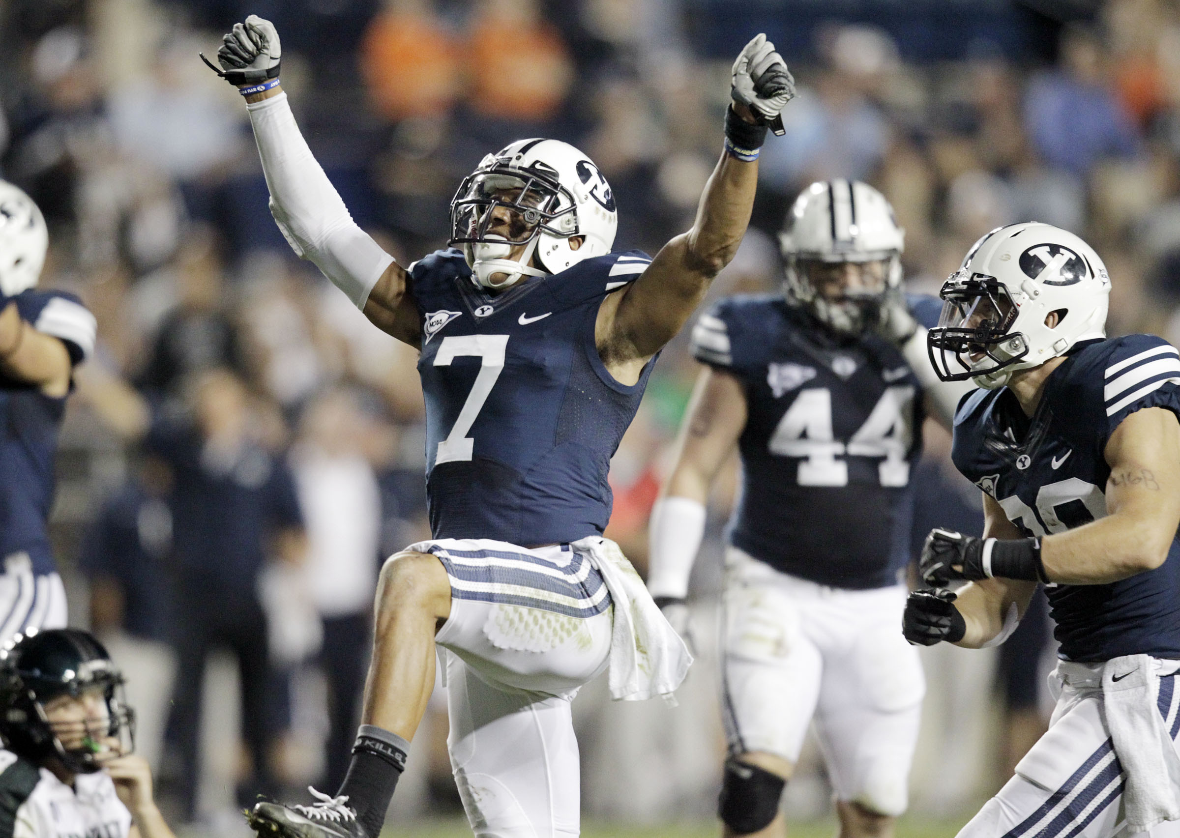 Brigham Young defensive back Preston Hadley (7) celebrates after causing a fumble on a sack that the Cougars recovered against Hawaii in Provo Friday, Sept. 28, 2012.