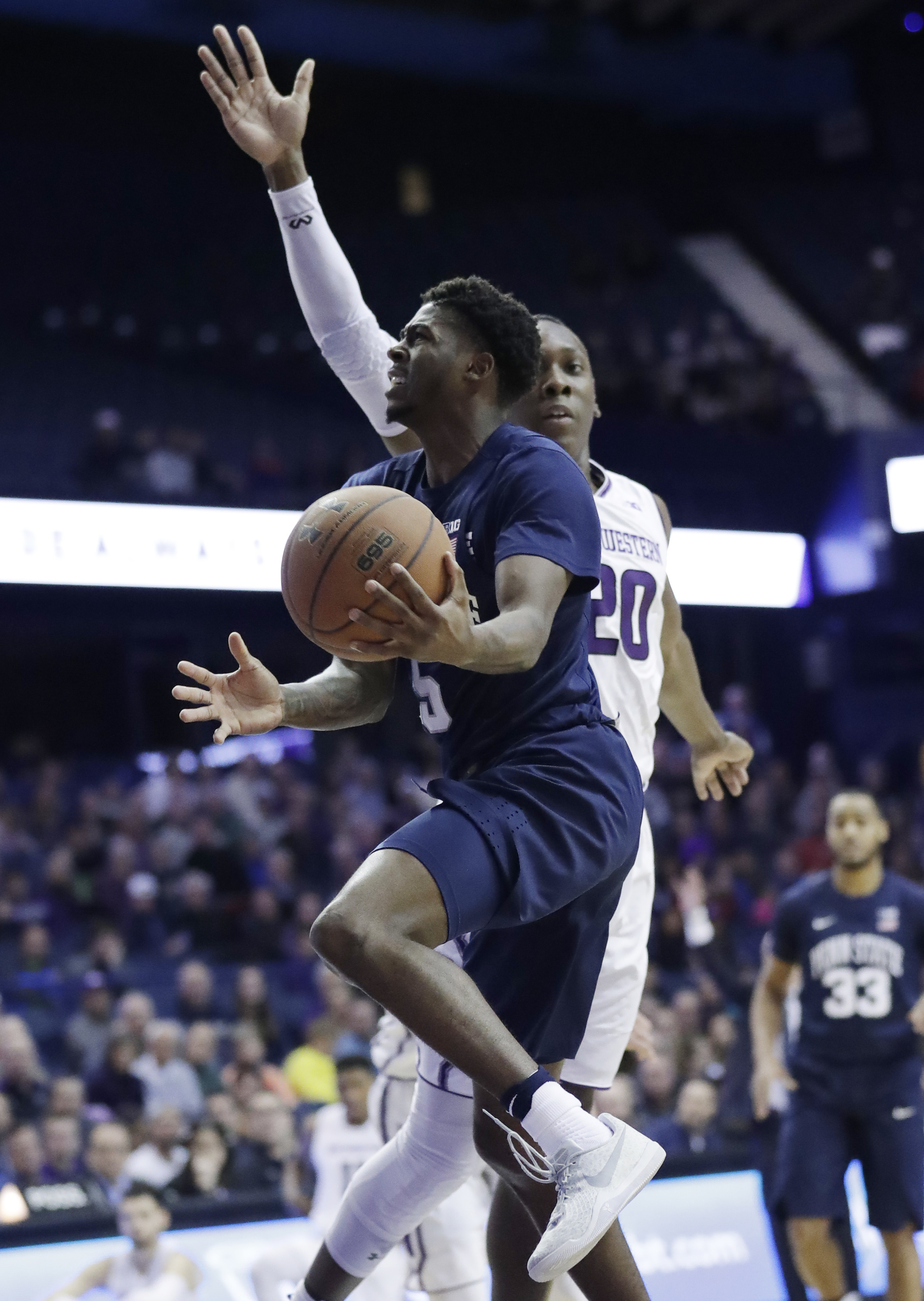 Law guides Northwestern to 70-61 win over Penn State