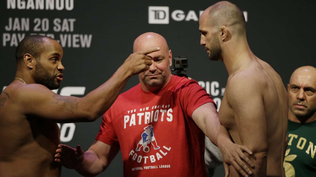 The Latest: Miocic keeps UFC heavyweight title with decision
