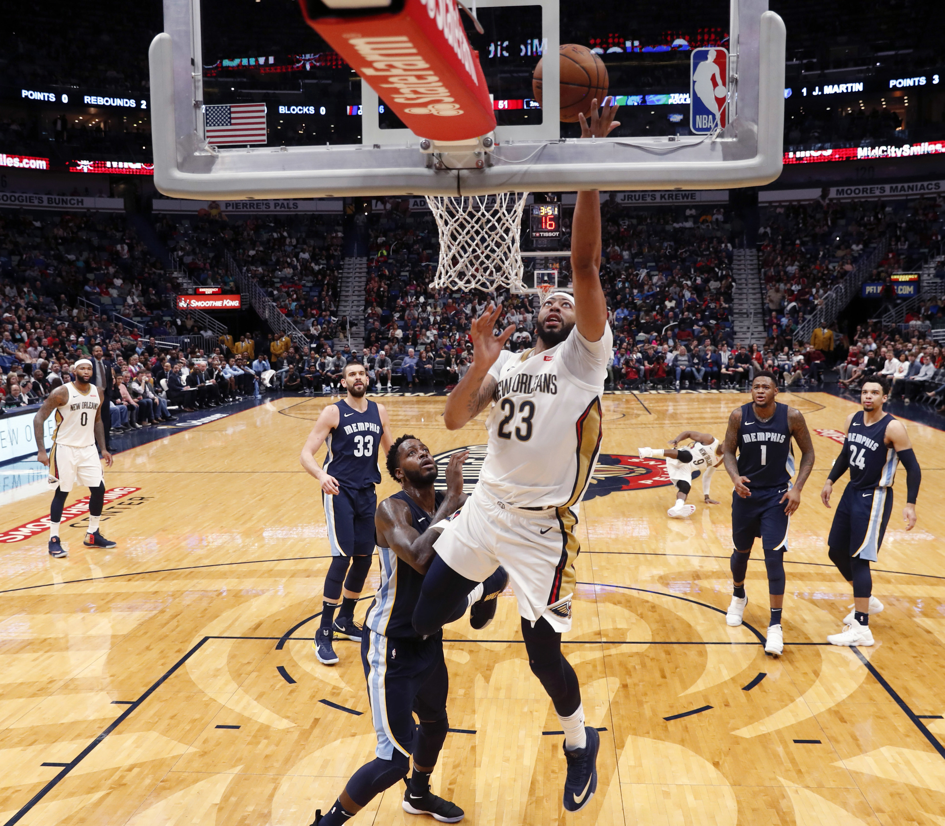 Holiday, Cousins, Davis lead Pelicans past Memphis 111-104