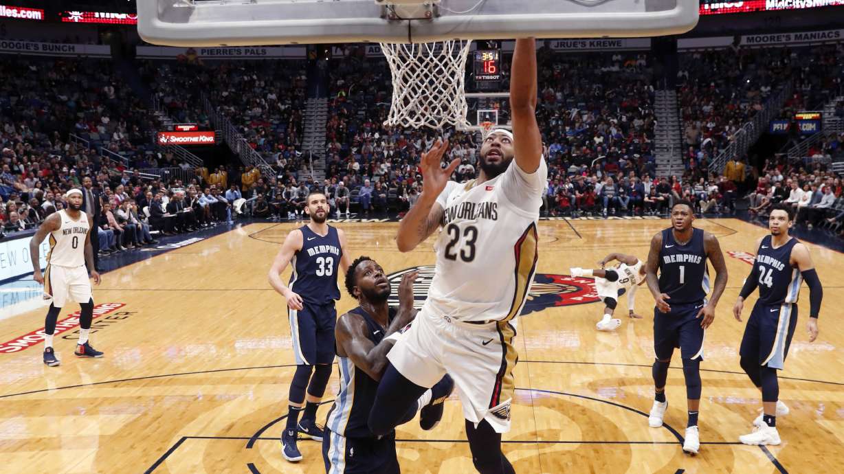 Holiday, Cousins, Davis lead Pelicans past Memphis 111-104