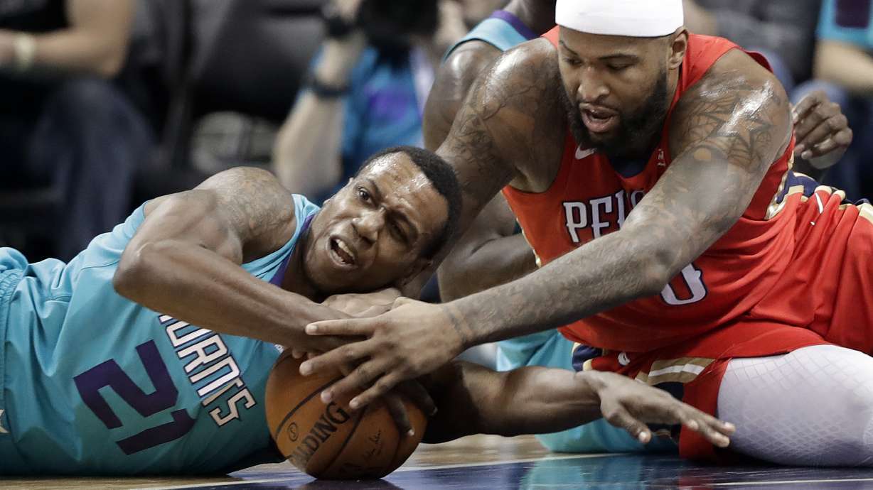 Holiday takes over, lifts Pelicans past Hornets 101-96