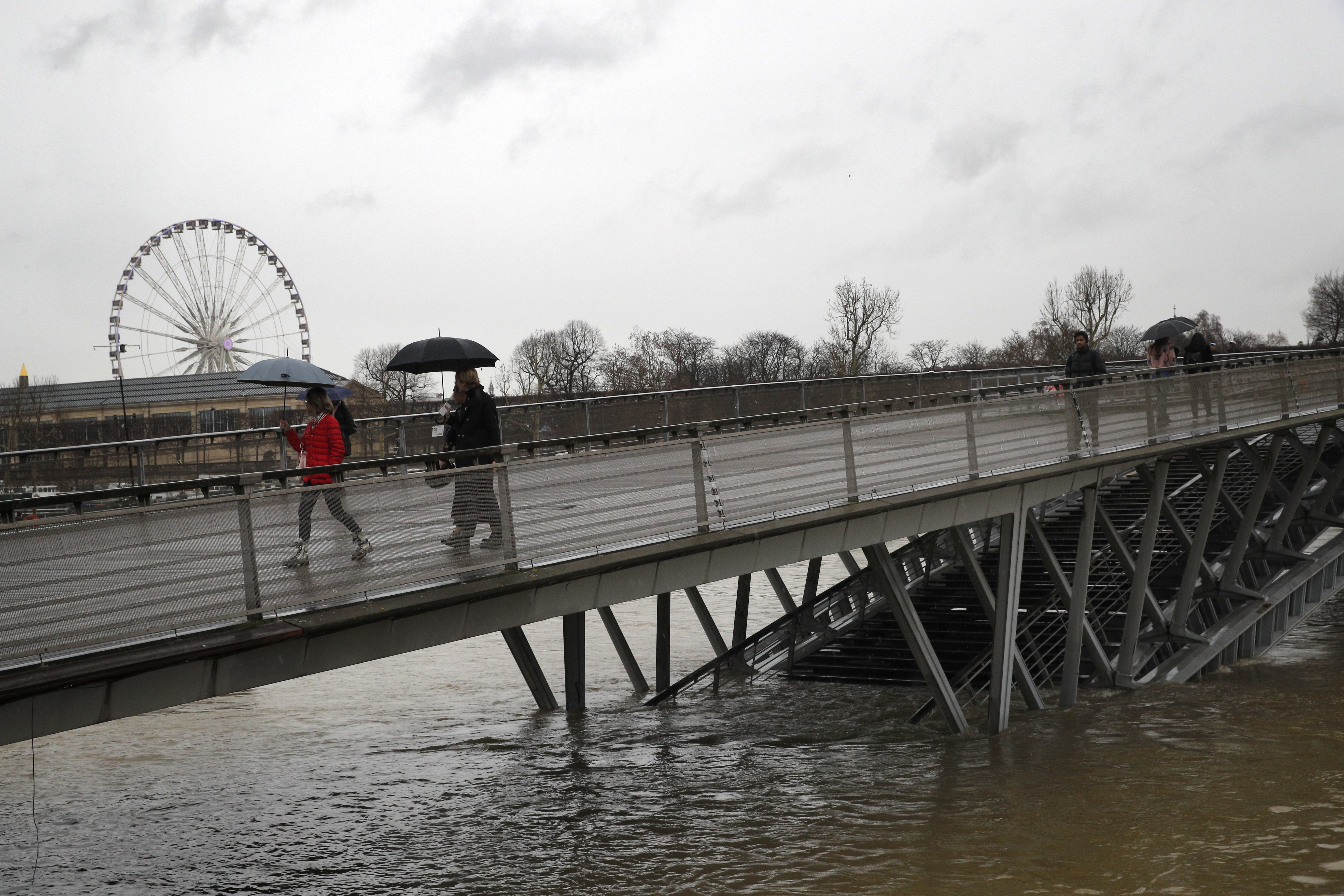 Floodwaters threaten Paris, closing roads, tunnels, cellars