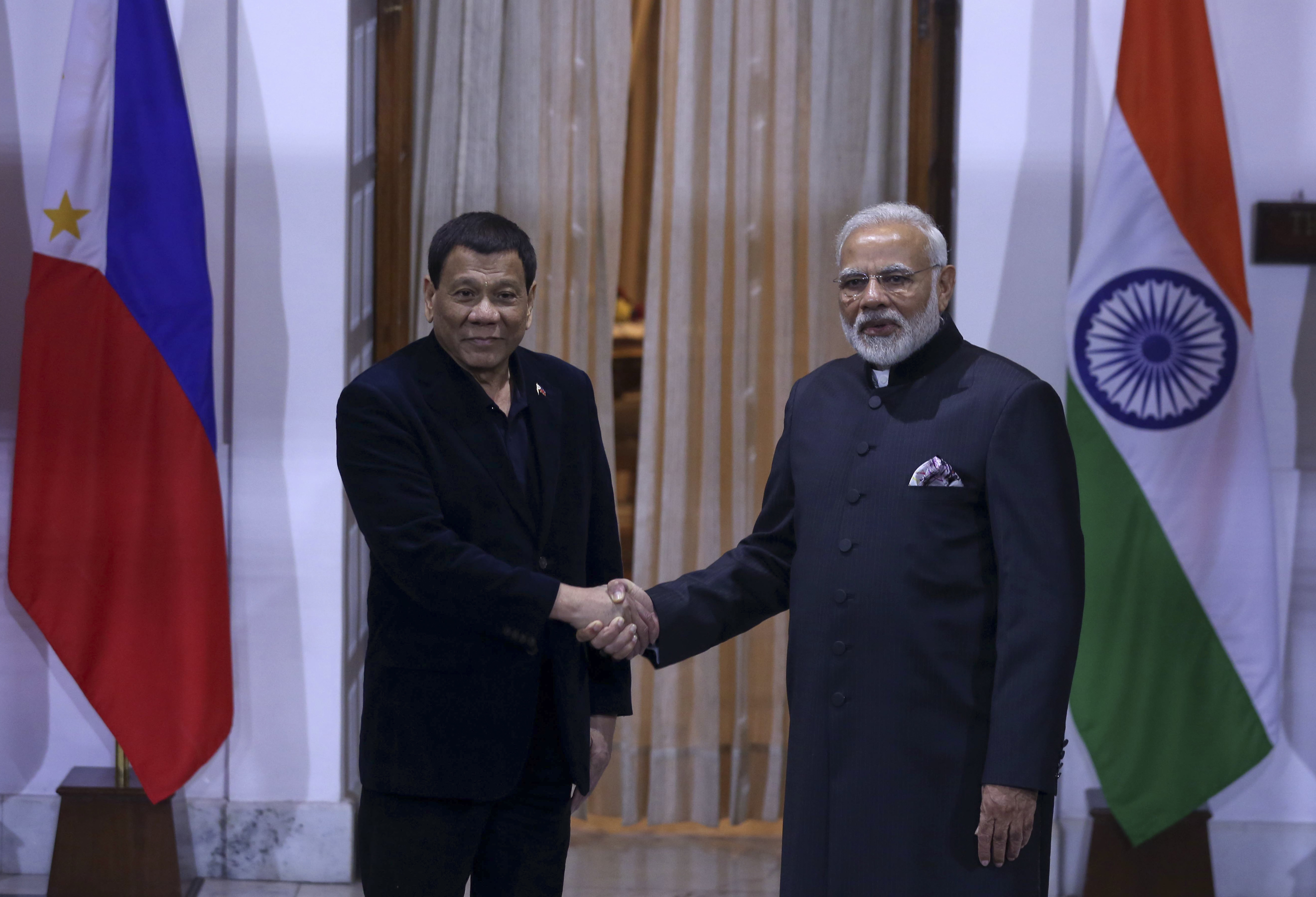 Philippine leader tells Suu Kyi to ignore rights criticism