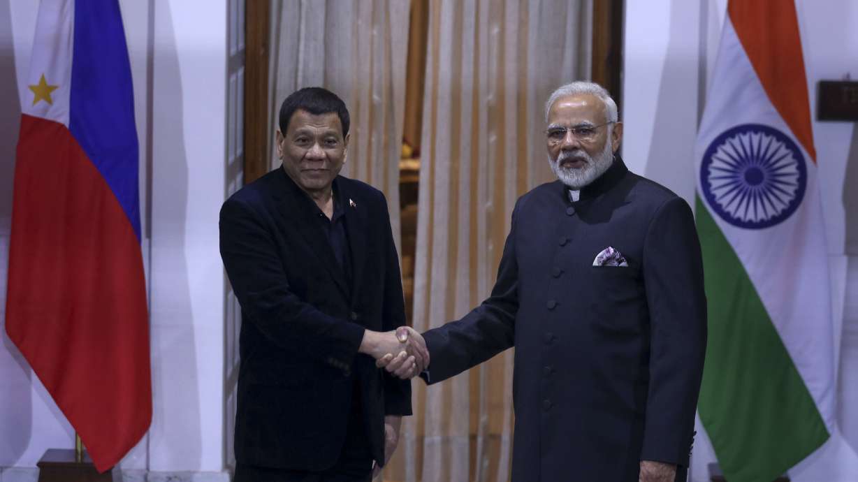 Philippine leader tells Suu Kyi to ignore rights criticism