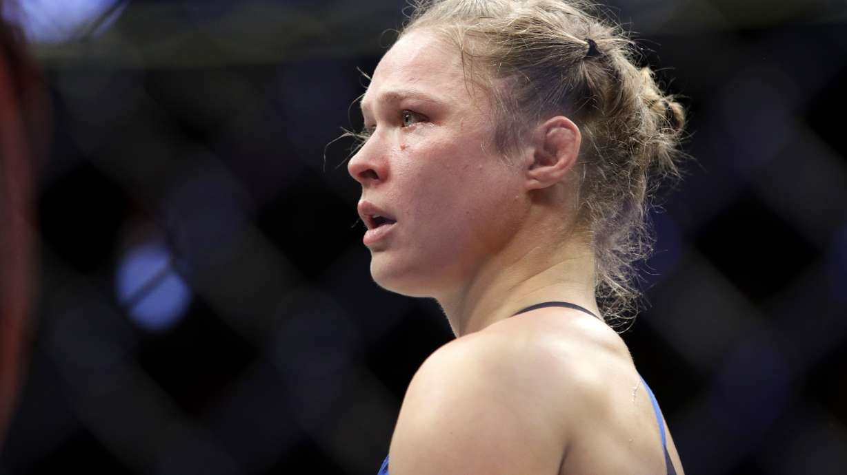 Rousey shifts to wrestling with surprise Royal Rumble cameo