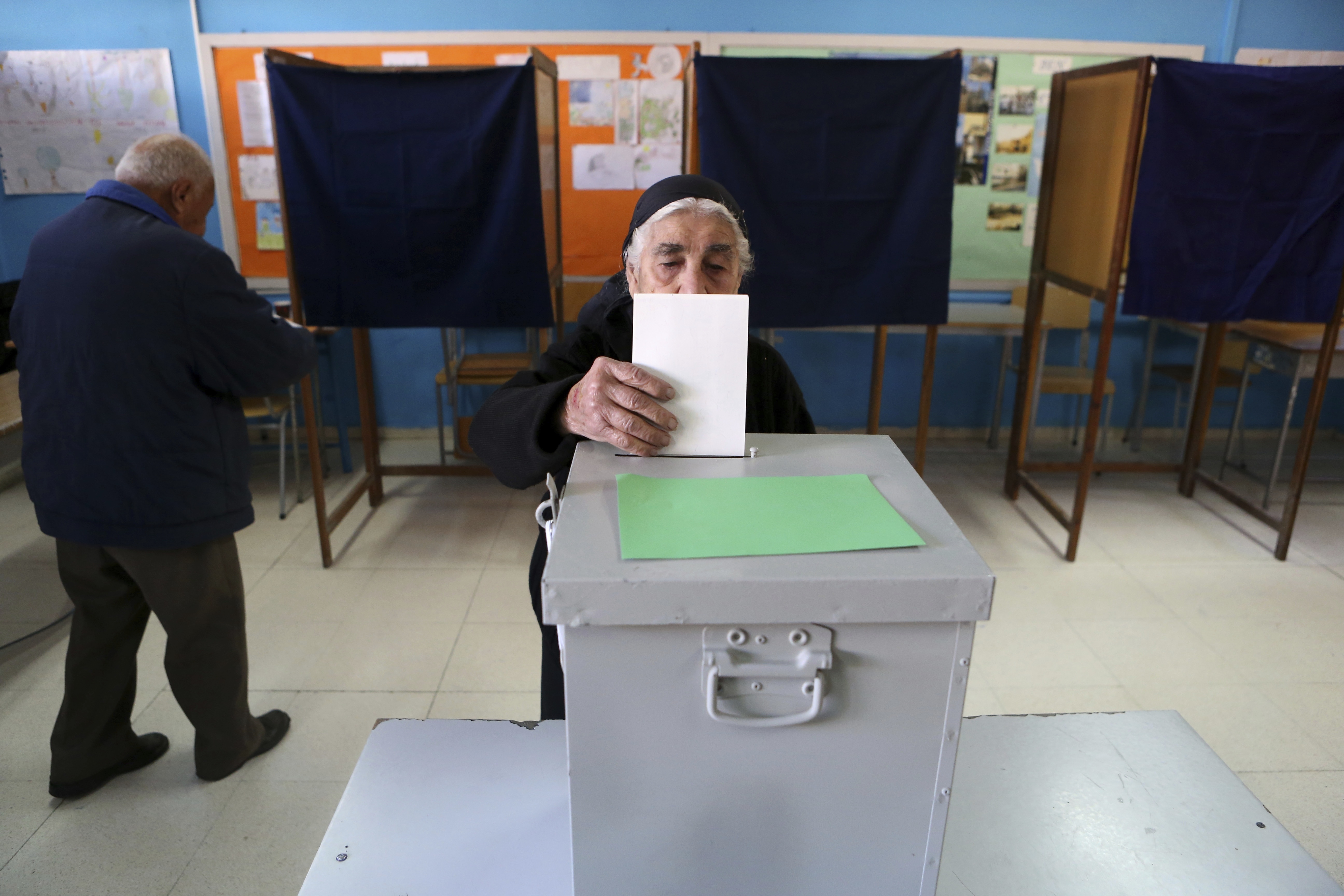 The Latest: Incumbent tops Cyprus vote, faces runoff