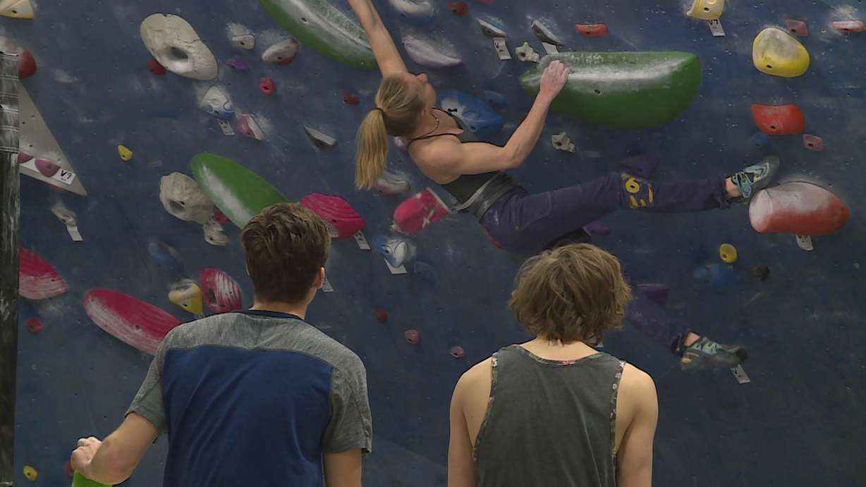 Sami Singleton attracts a small audience at Momentum Indoor Climbing in Millcreek on January 23rd, 2018. (Photo: Ray Boone, KSL TV)