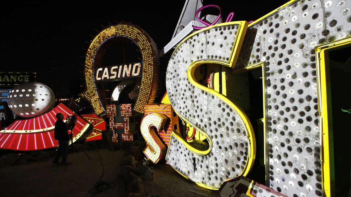 Historic Vegas neon signs shine bright for 1st time in years