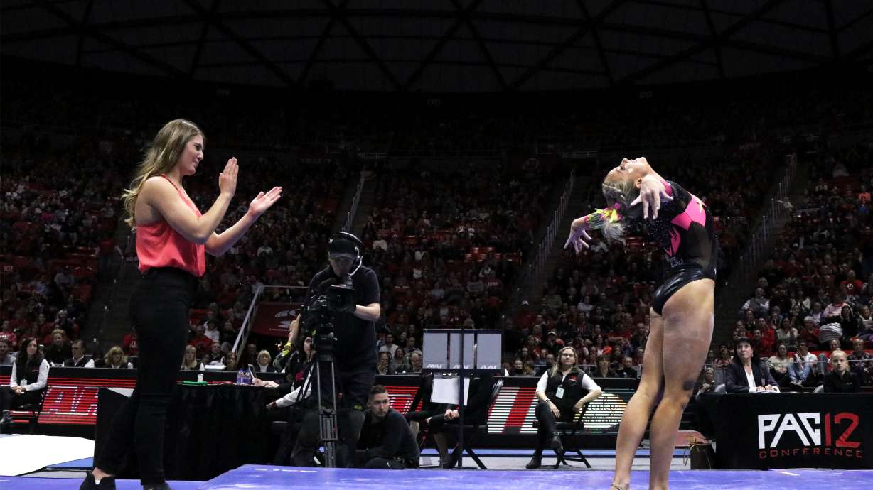 MyKayla Skinner strikes a pose during a gymnastics meet at the University of Utah.