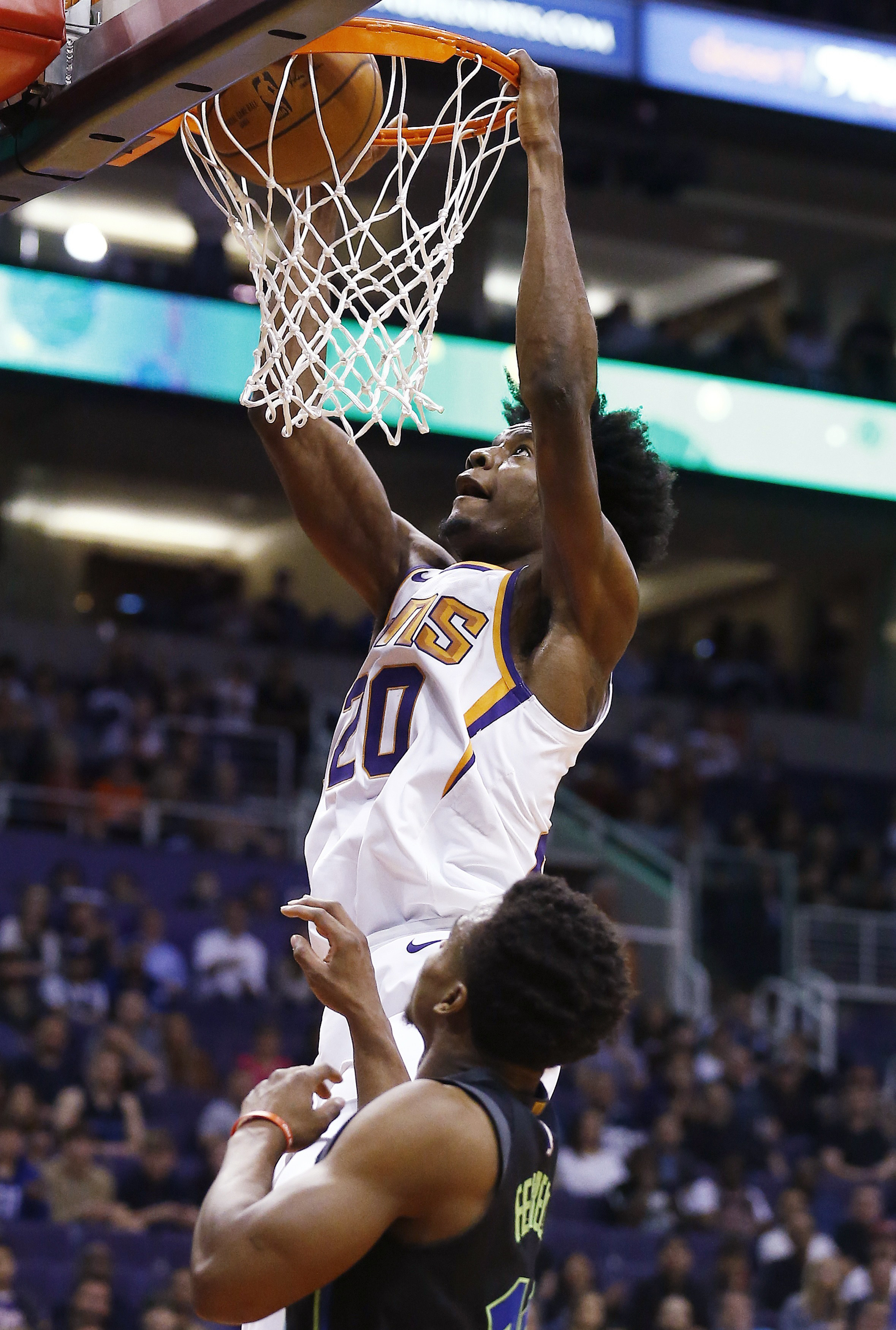 Canaan hurt but Suns stop skid with 102-88 win over Mavs