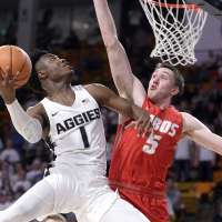 McEwen's career night helps Utah State win battle of depleted lineups