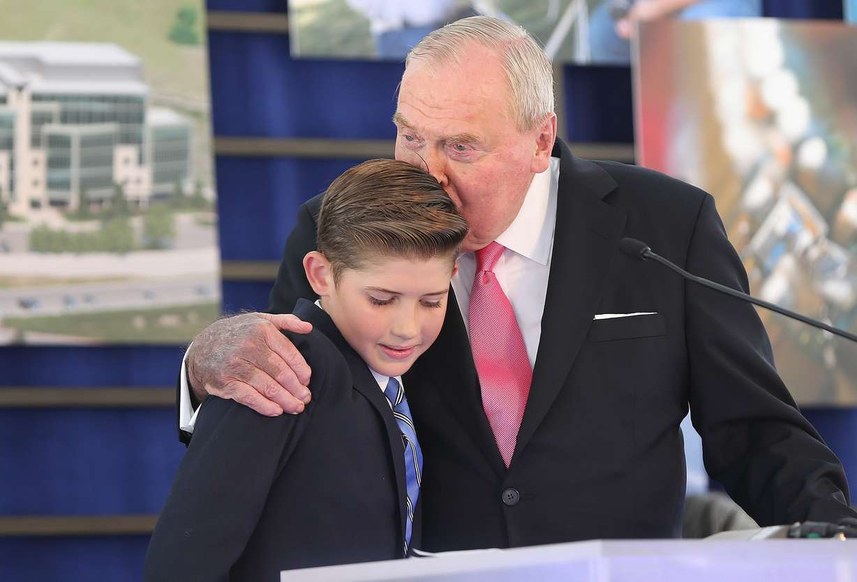 Jon Huntsman Sr. kisses Andrew Van Wagoner after the 11-year-old donated $119 during the grand opening of the Primary Children's and Families' Cancer Research Center at Huntsman Cancer Institute in Salt Lake City on Wednesday, June 21, 2017. The new facility is dedicated to the study of genetically traced cancers known to afflict children. (Photo: Jeffrey D. Allred, KSL)