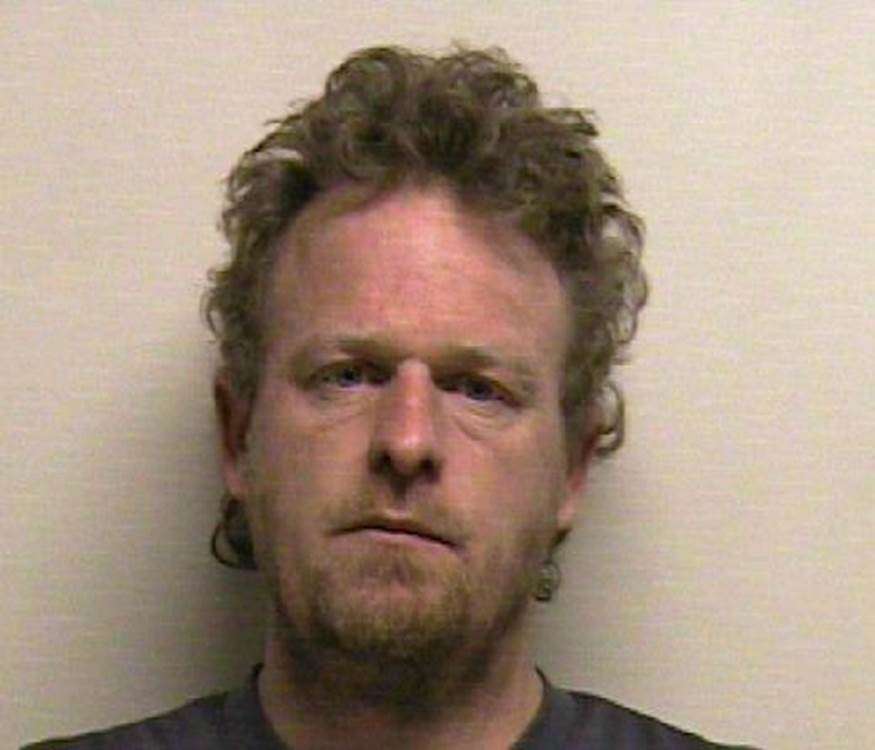 Springville police said Paul Douglas Anderson, 40, was arrested on suspicion of assaulting a police officer, resisting arrest, theft, burglary and failing to stop at an officer's command. (Photo: Utah County Sheriff's Office)