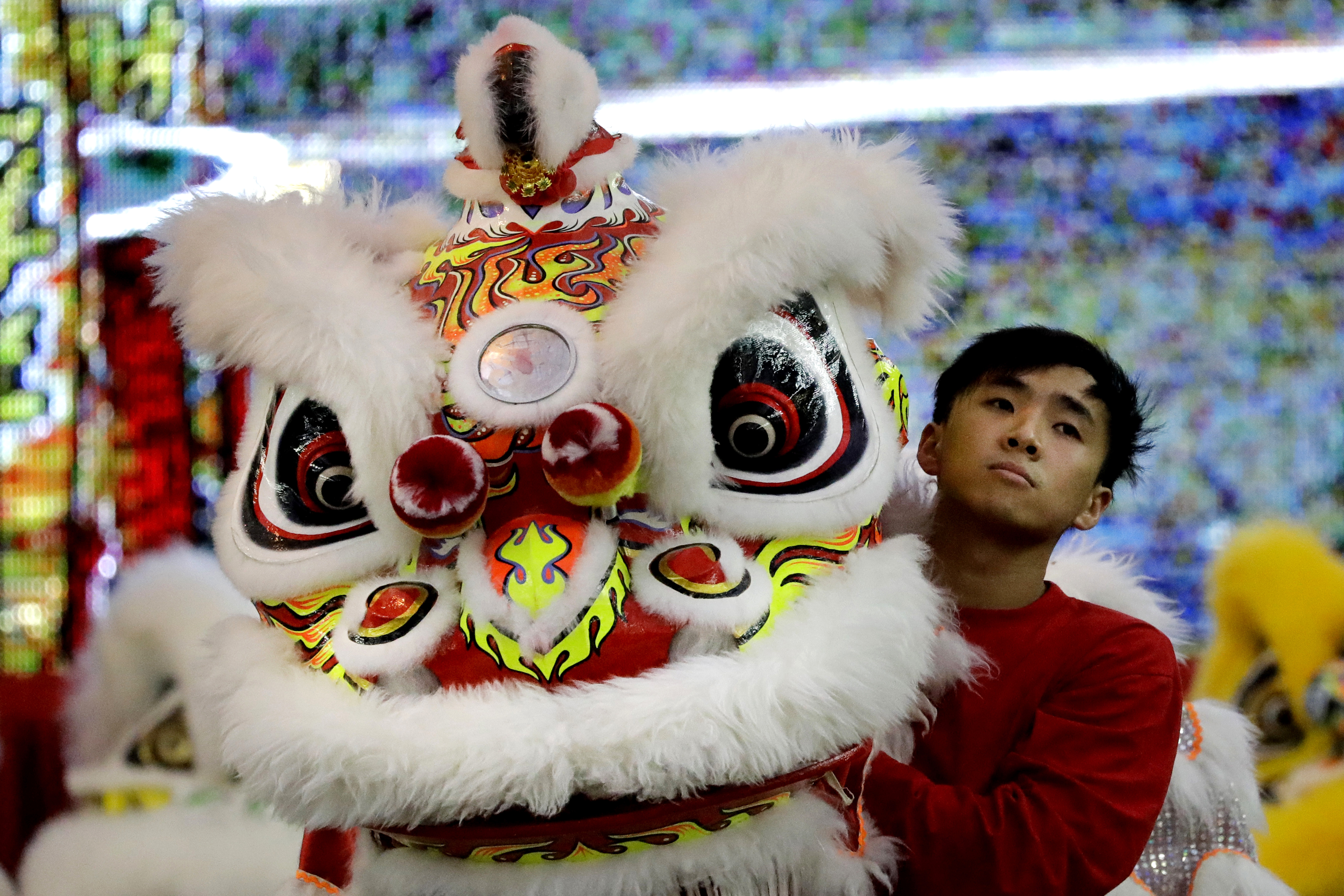 AP PHOTOS: Lion dance in Singapore ahead of Lunar New Year