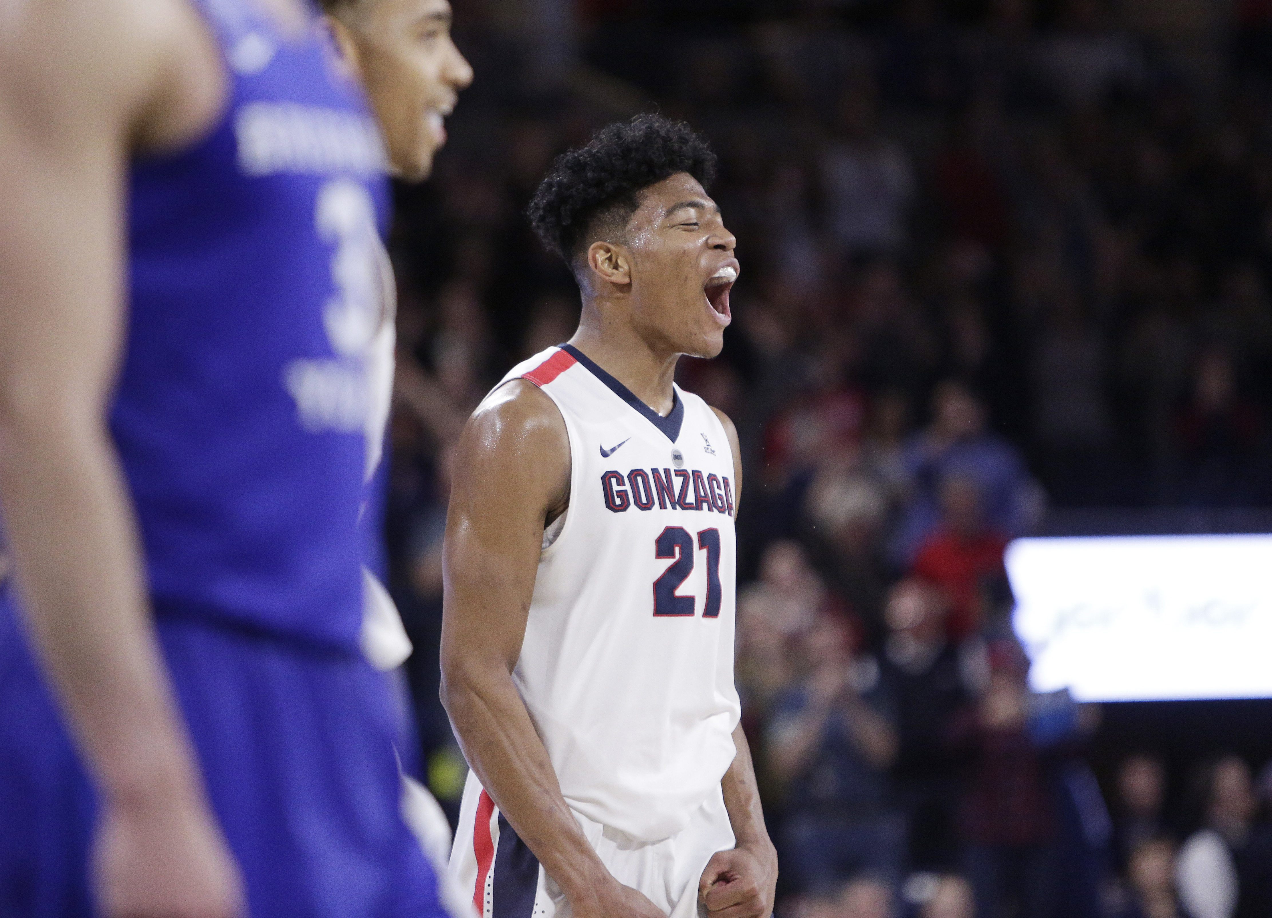 Gonzaga forward Rui Hachimura (21) celebrates late in the second half of the team's NCAA college basketball game against BYU in Spokane, Wash., Saturday, Feb. 3, 2018. Gonzaga won 68-60. (AP Photo, Young Kwak)