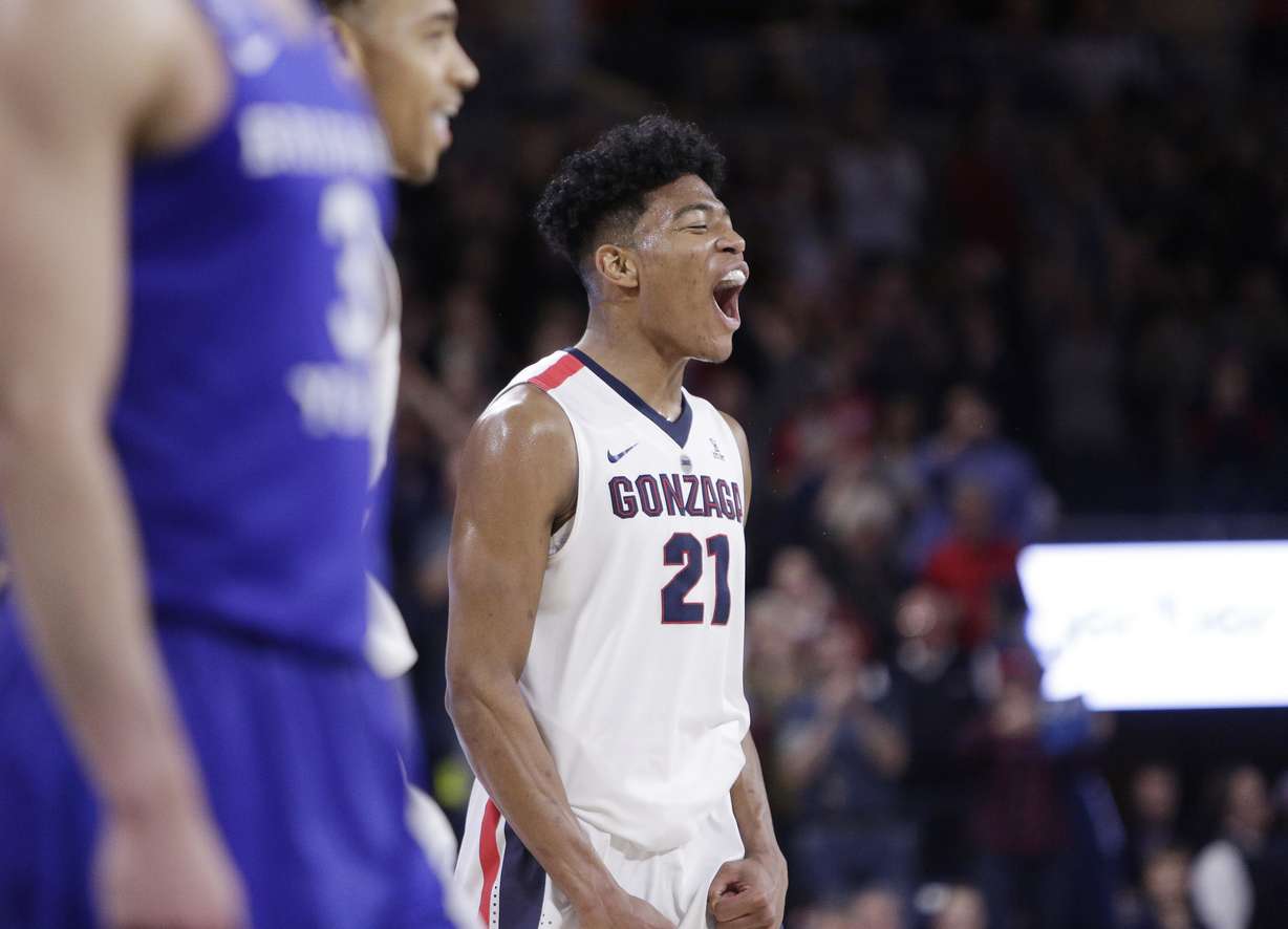 Gonzaga forward Rui Hachimura (21) celebrates late in the second half of the team's NCAA college basketball game against BYU in Spokane, Wash., Saturday, Feb. 3, 2018. Gonzaga won 68-60. (AP Photo, Young Kwak)