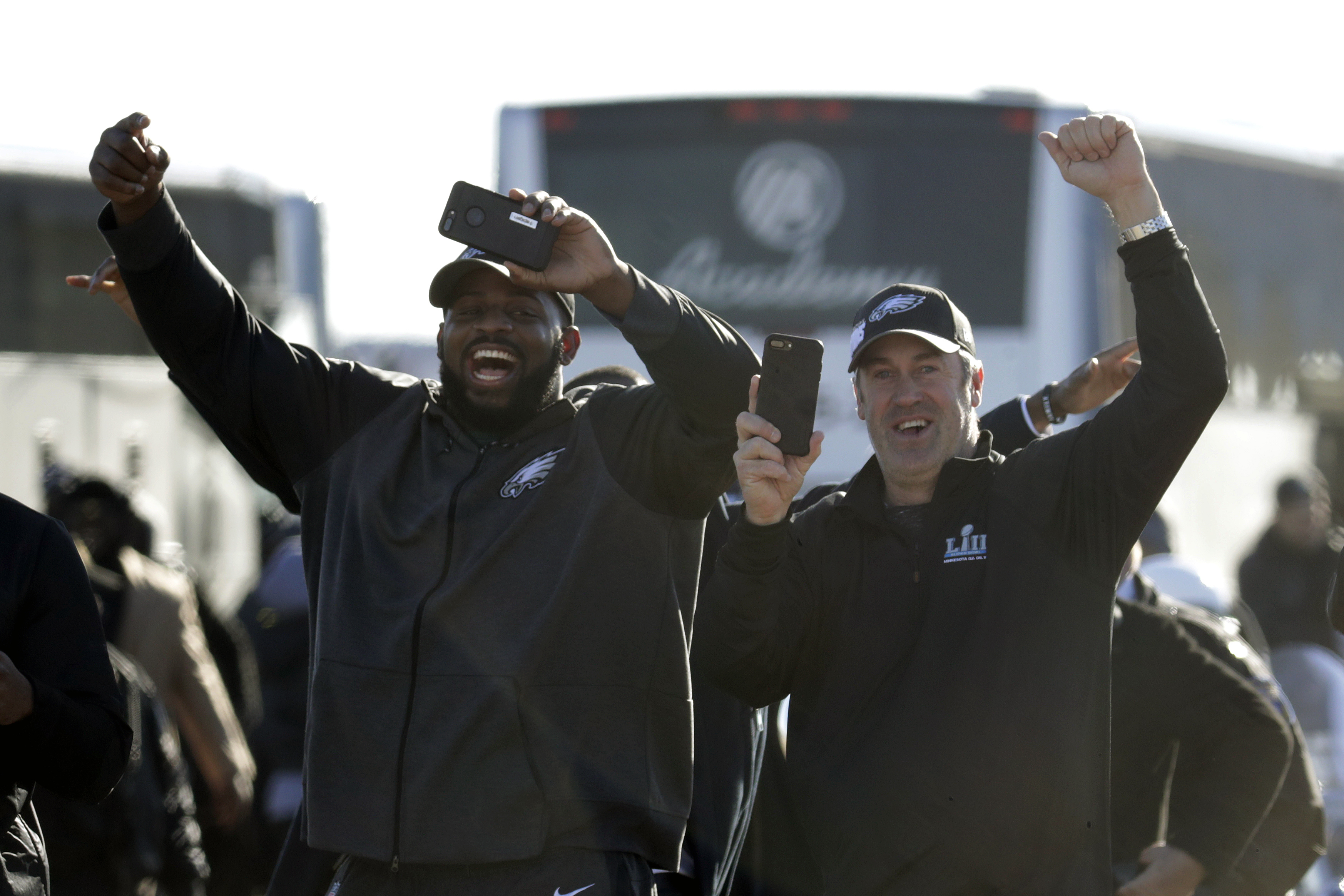 The Latest: Man charged with assaulting AP photographer