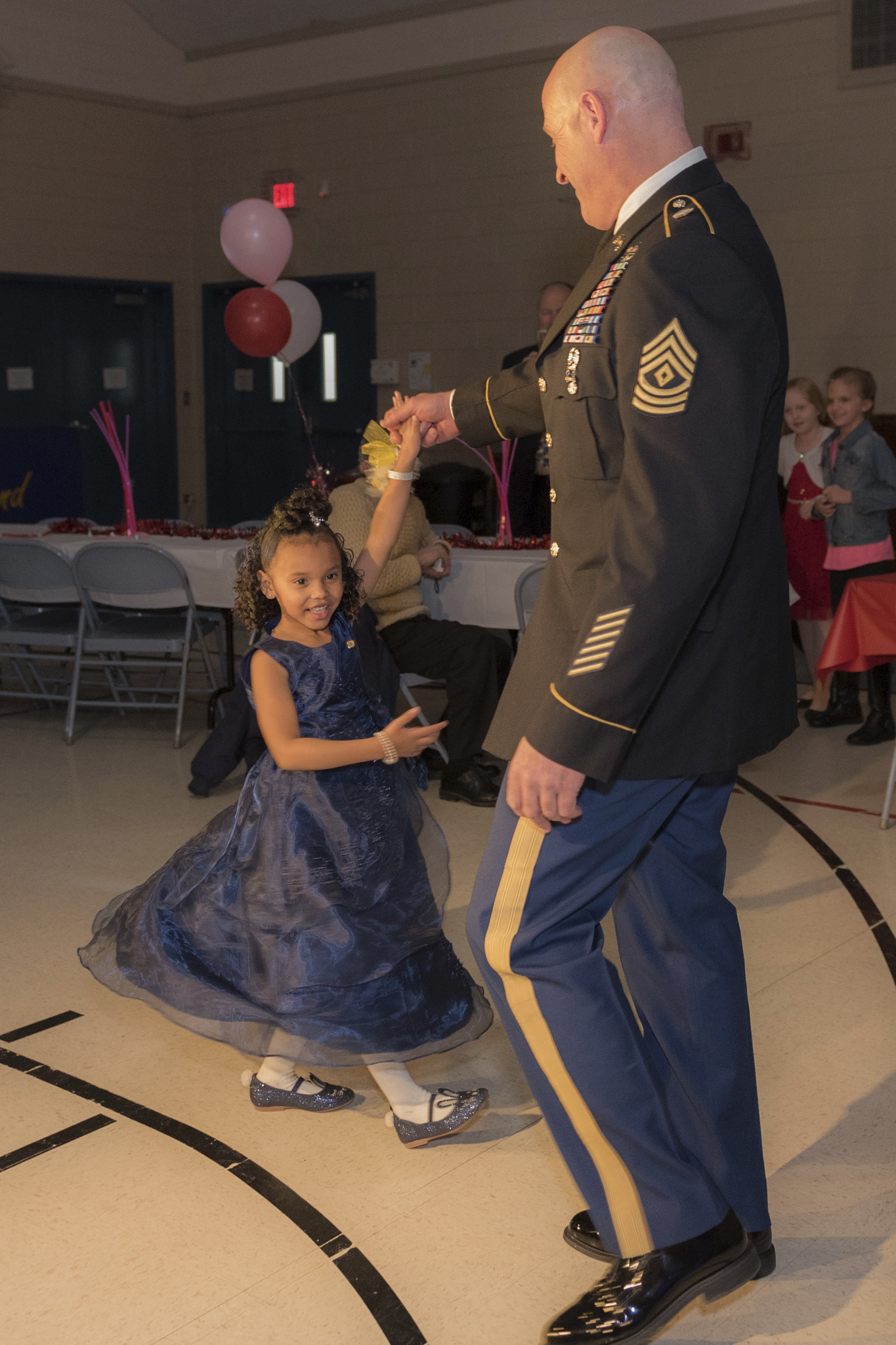 National guardsman takes girl whose dad was killed to dance