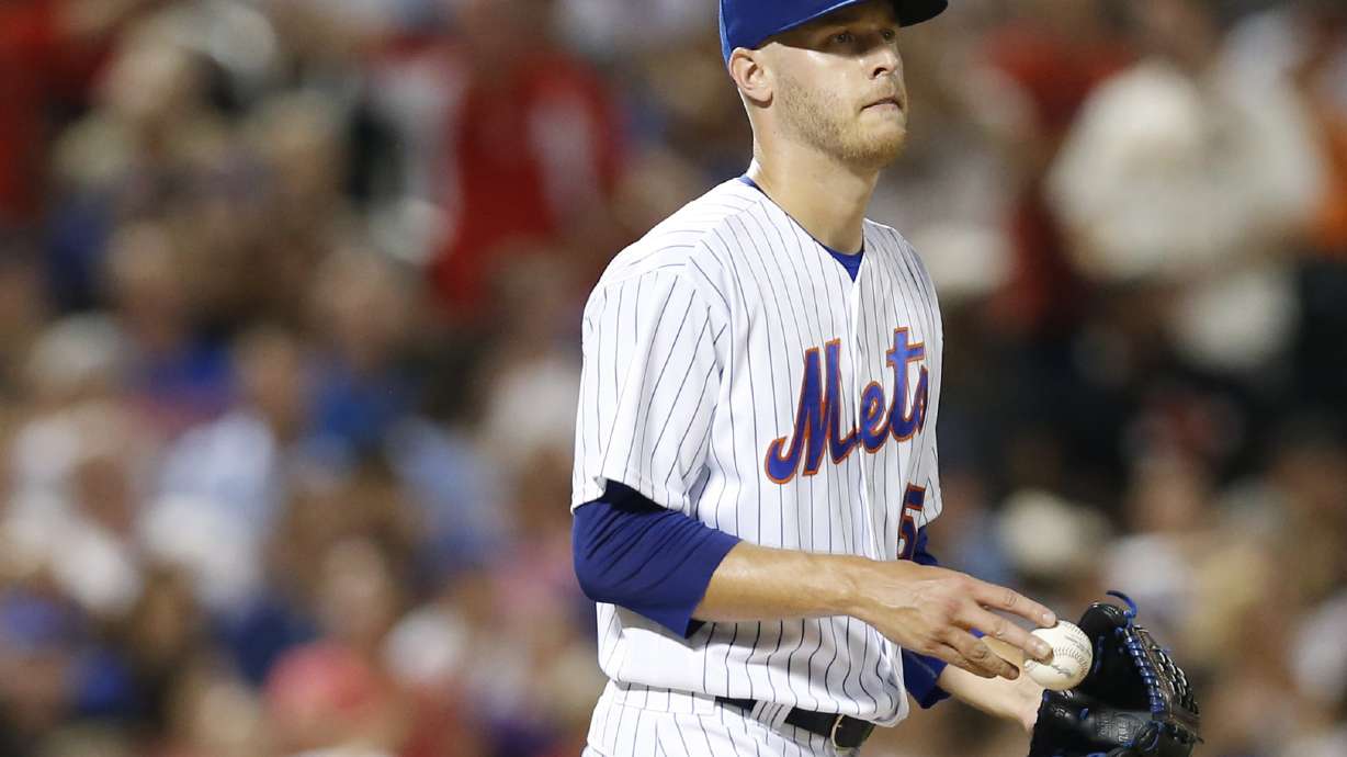 Wheeler beats Mets in arbitration, Grimm loses to Cubs