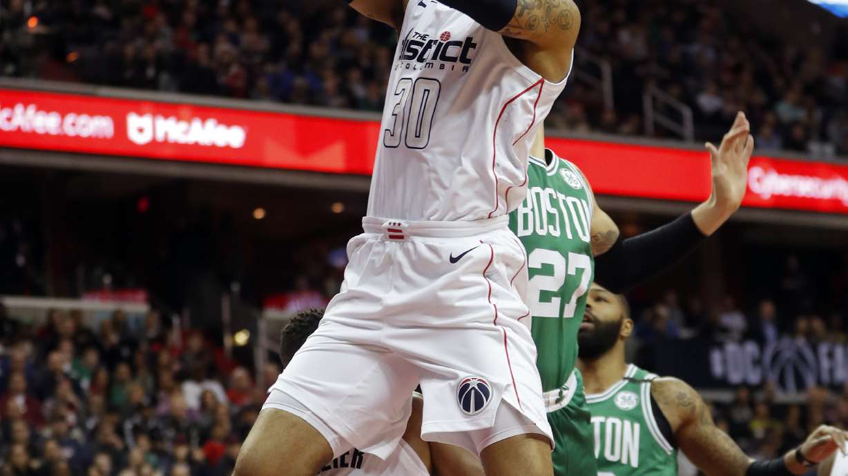 Irving, Brown lead Celtics to 110-104 OT win over Wizards