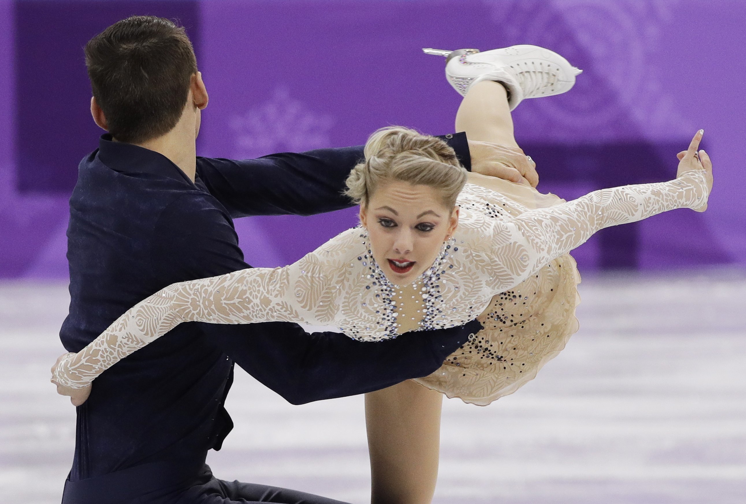 Knierims rescue US on opening day of Olympic team event