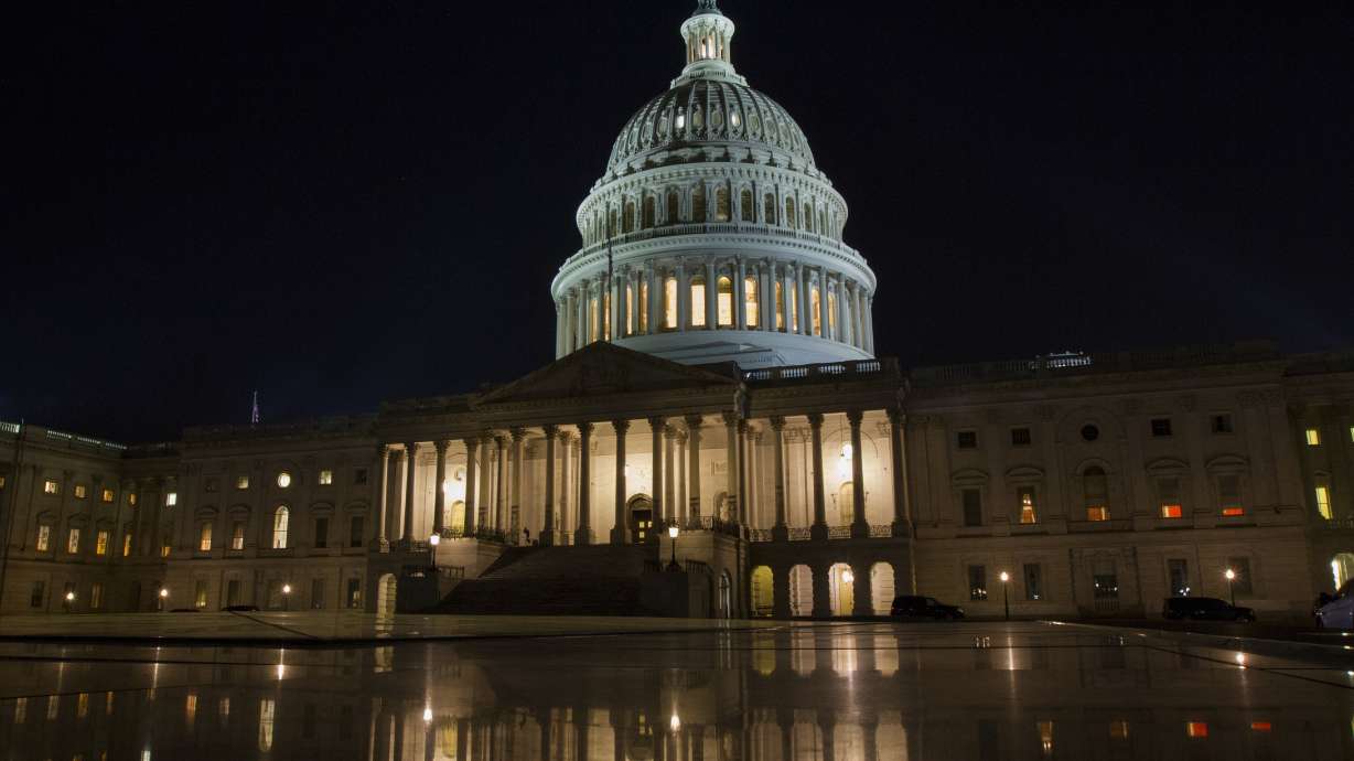 The Latest: Trump pushes for more Republicans in Congress