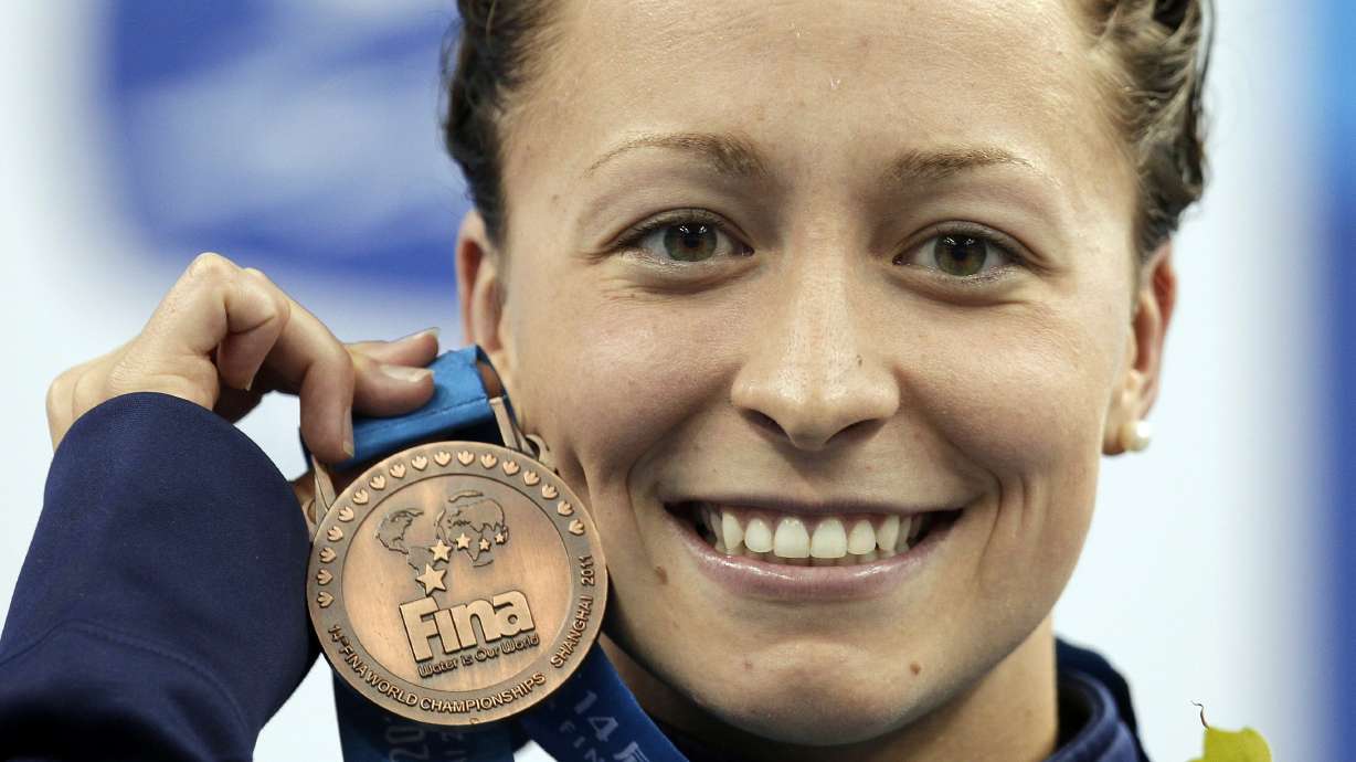 The Latest: Olympic swimmer pens essay describing abuse