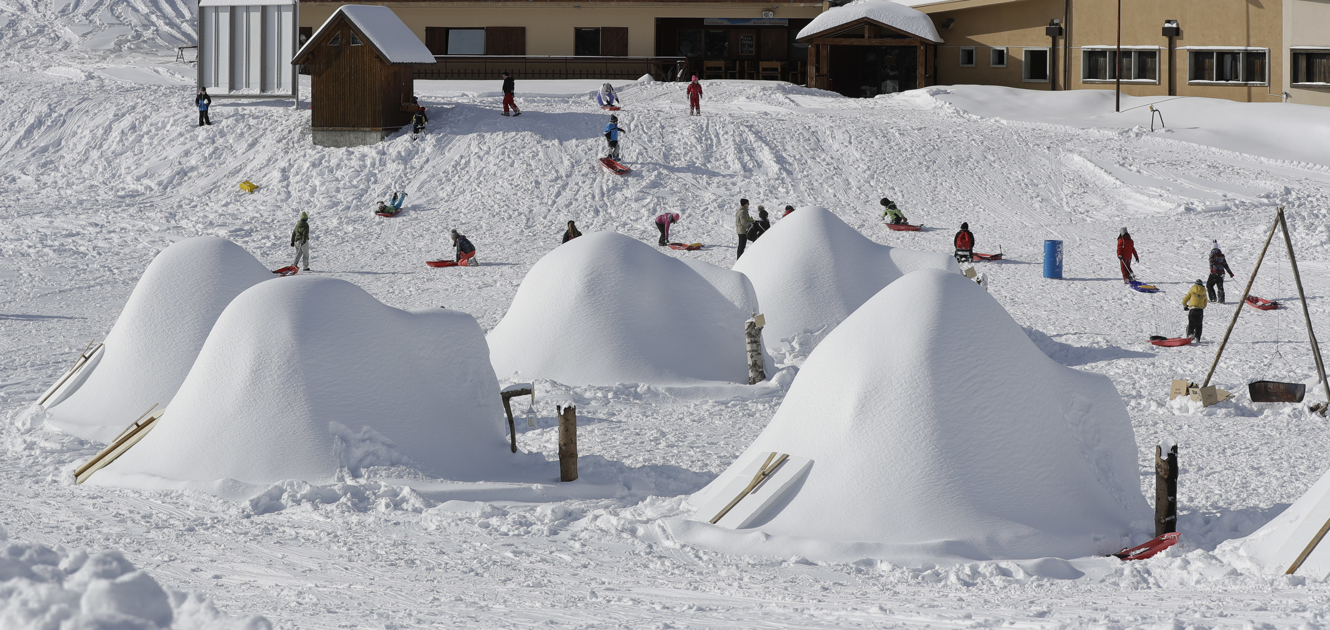 Igloos built by migrants warm hearts in Italian Alps village