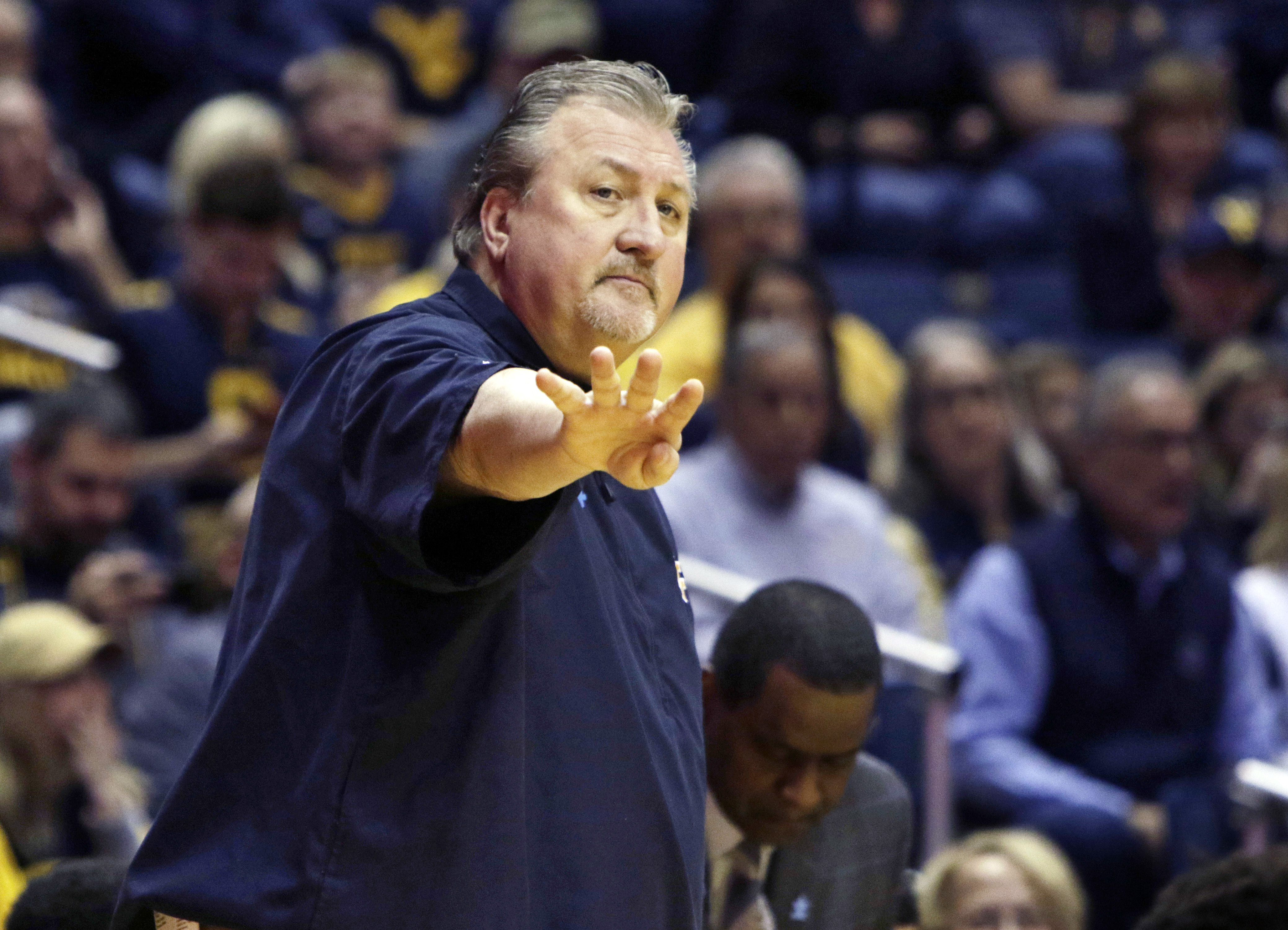 Oklahoma State tops struggling No. 19 West Virginia 88-85