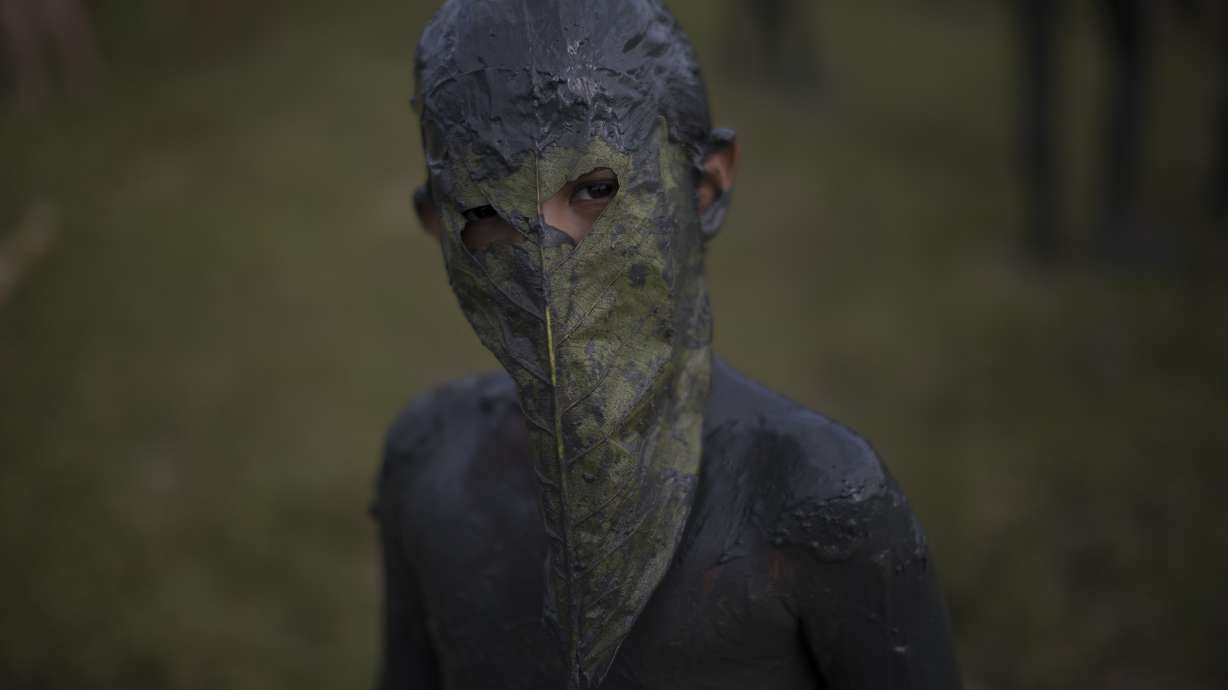 Flying sludge, dirty kisses at Brazil Carnival 'mud party'