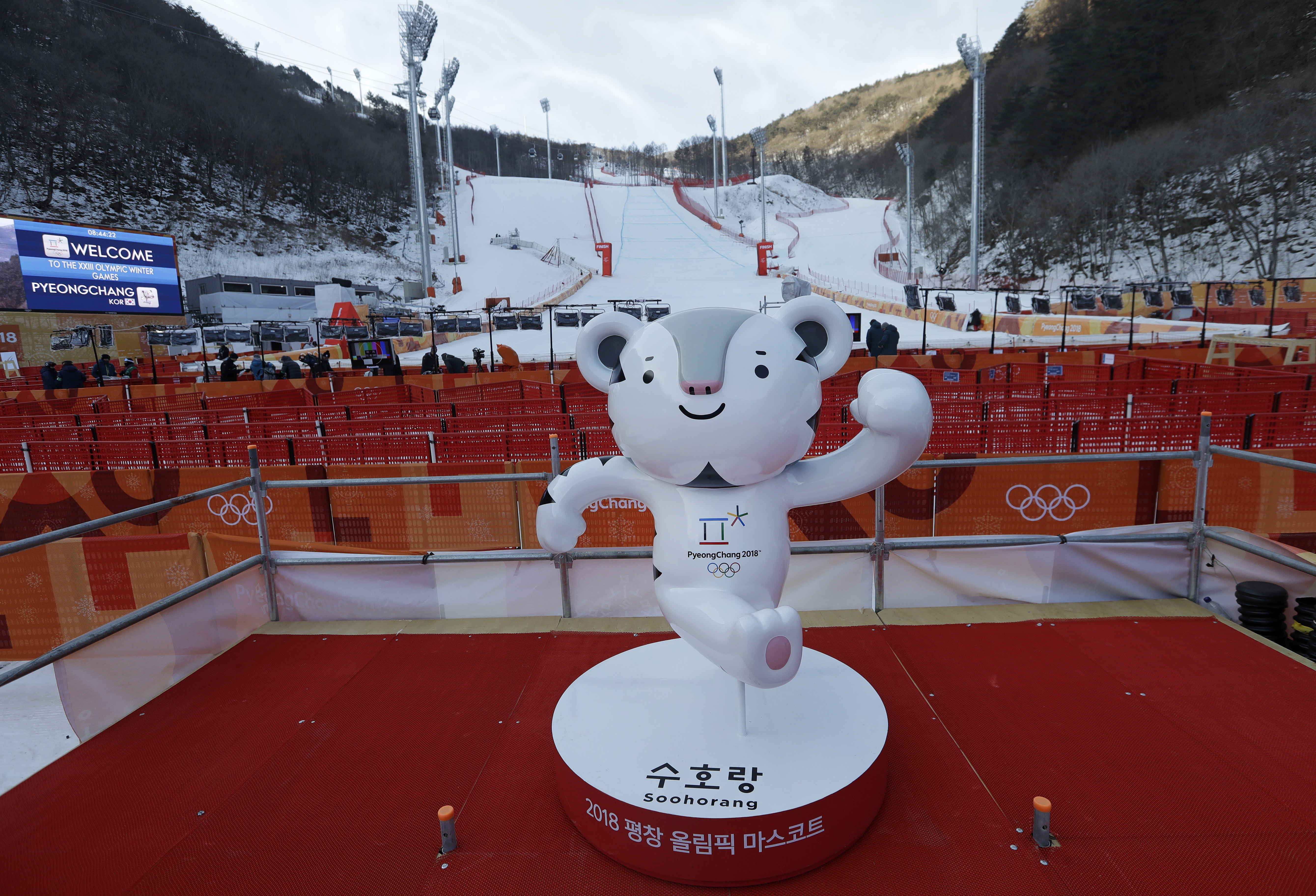 The Latest: Norway's Krueger wins gold despite early fall