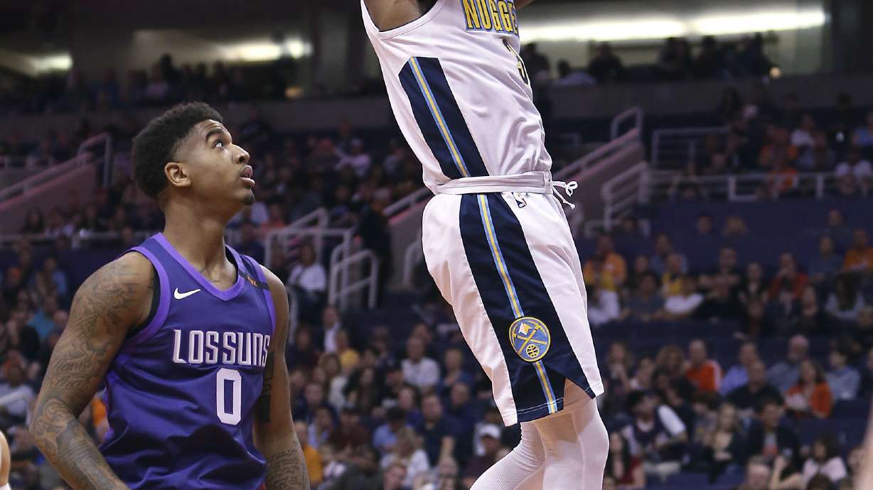 Nuggets use big second-half run to beat Suns 123-113
