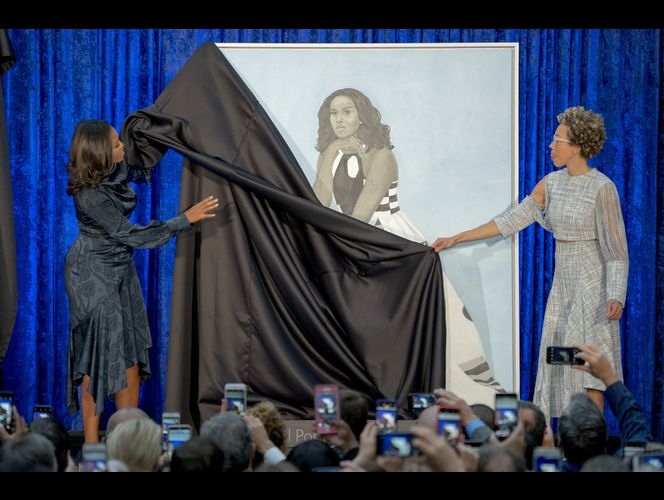The Latest: Obama: Working with artist on a portrait a \'joy\'
