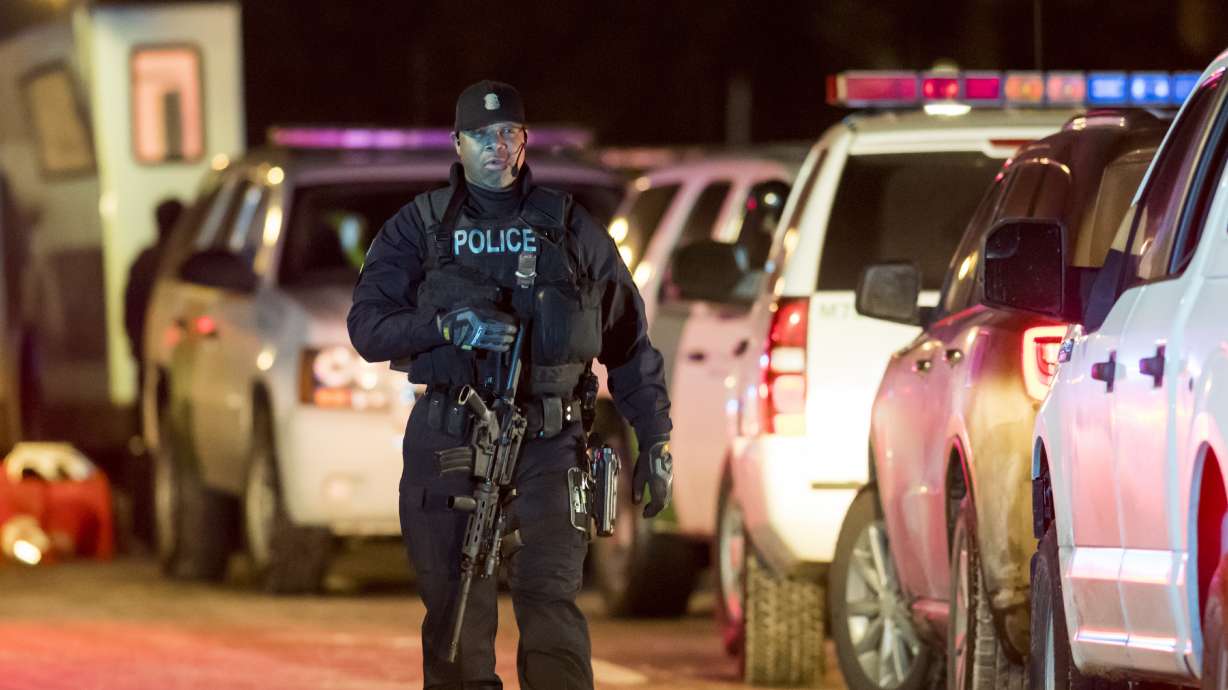 The Latest: Police identify gunman in Detroit standoff