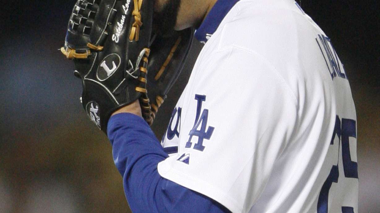 The Latest: Ex-All Star pitcher Esteban Loaiza arrested