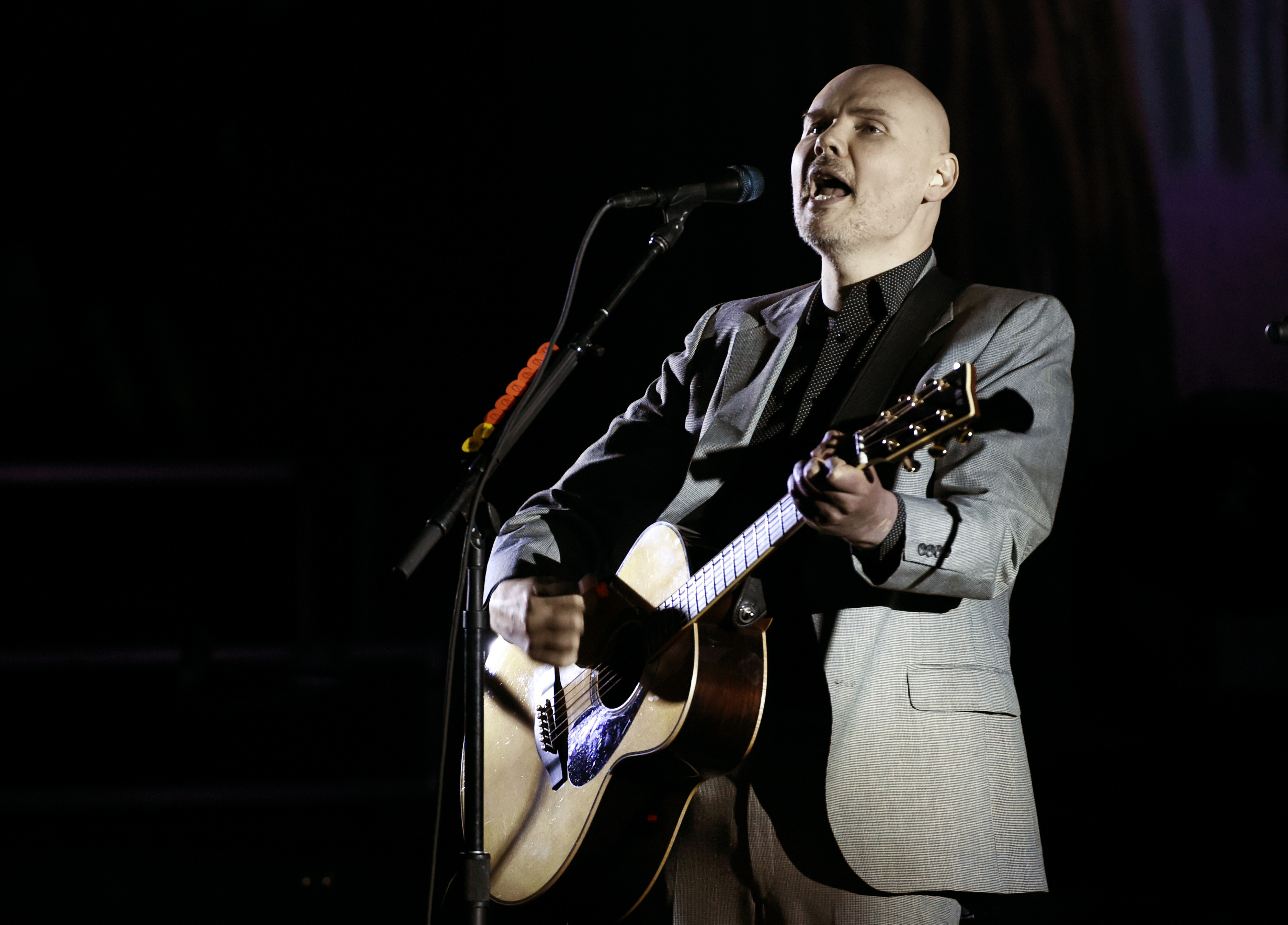 Rep: Smashing Pumpkins tried to include bassist in reunion