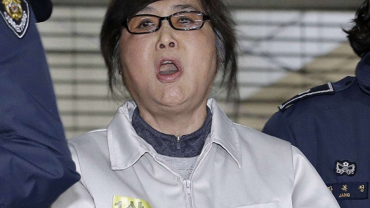 The Latest: Confidante of ex-SKorean leader vows to appeal