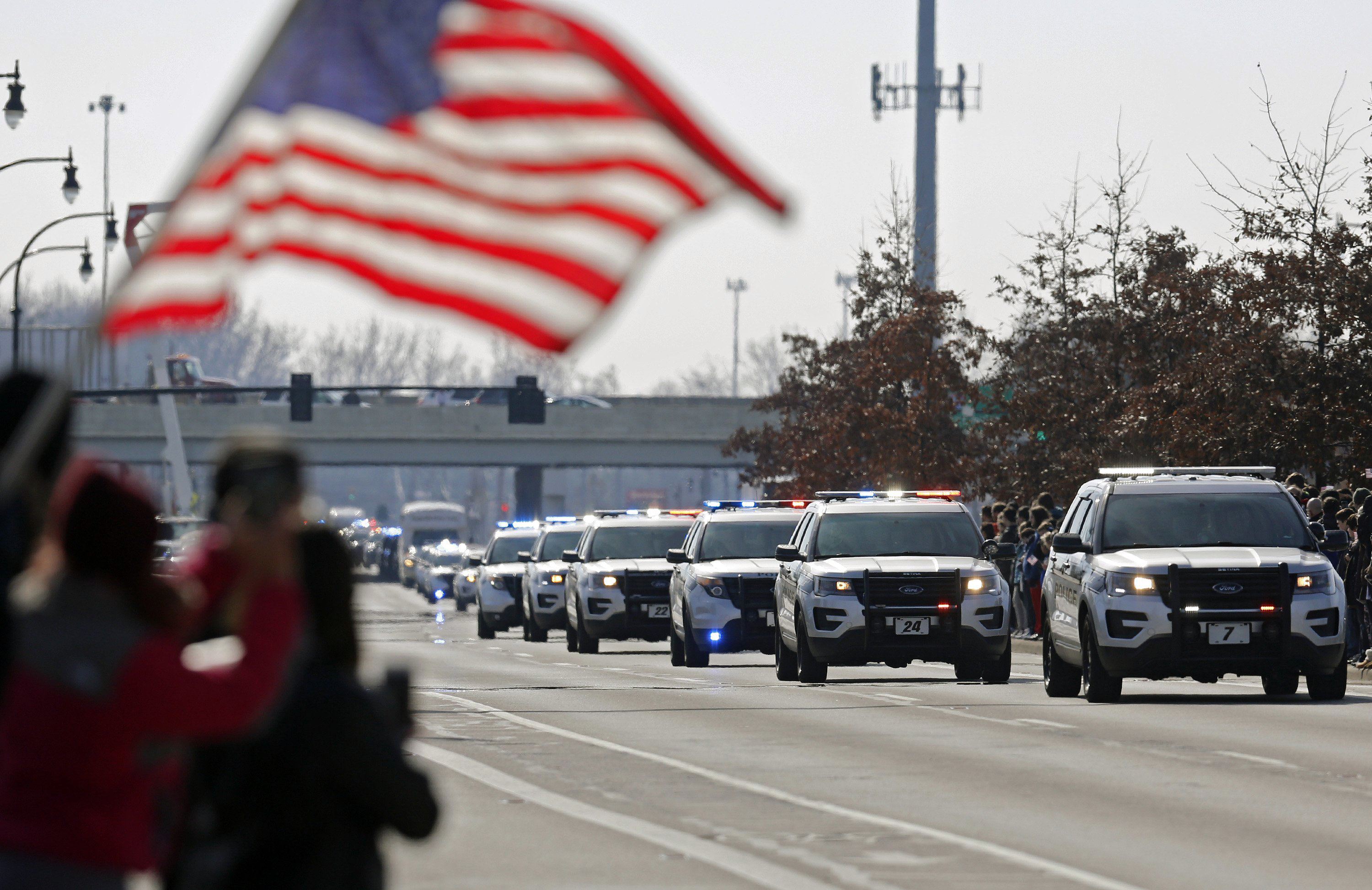 2 slain Ohio officers' families thank community for support