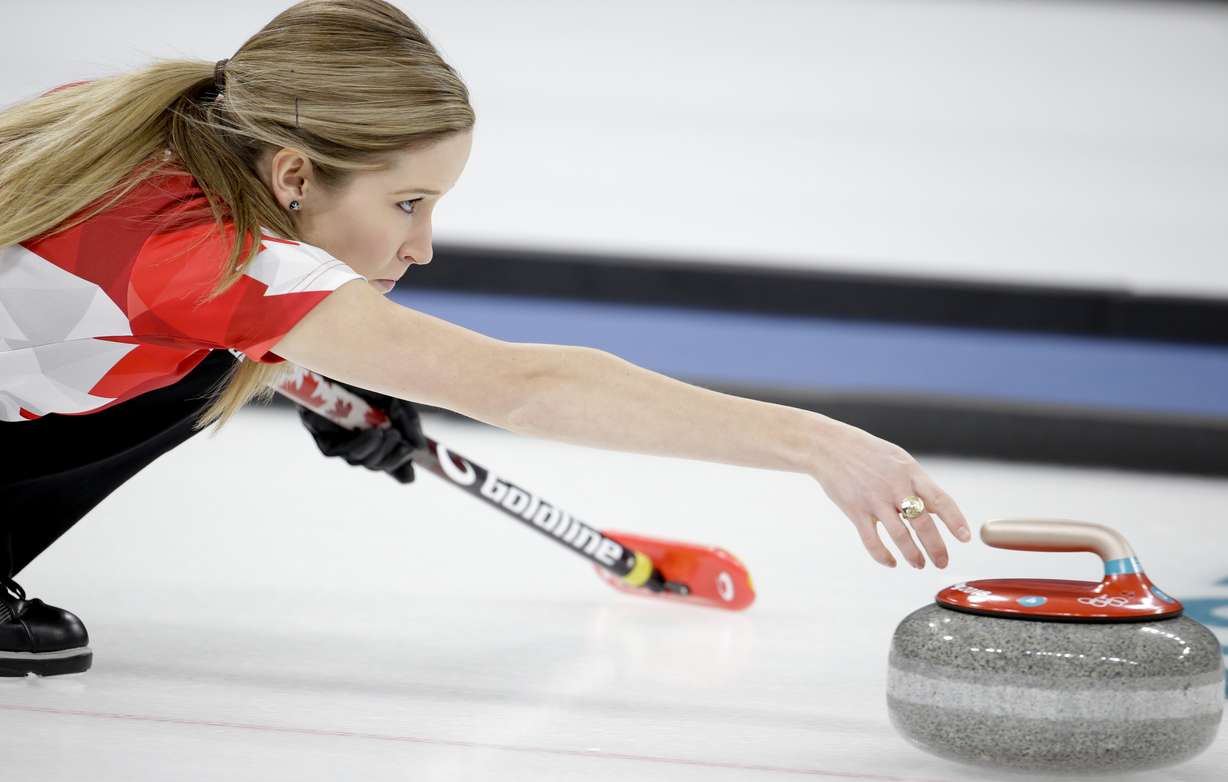 Canada's Kaitlyn Lawes throws a stone during the mixed doubles final curling match against Switzerland Jenny Perret and Martin Rios at the 2018 Winter Olympics in Gangneung, South Korea, Tuesday, Feb. 13, 2018. (AP Photo/Natacha Pisarenko)
