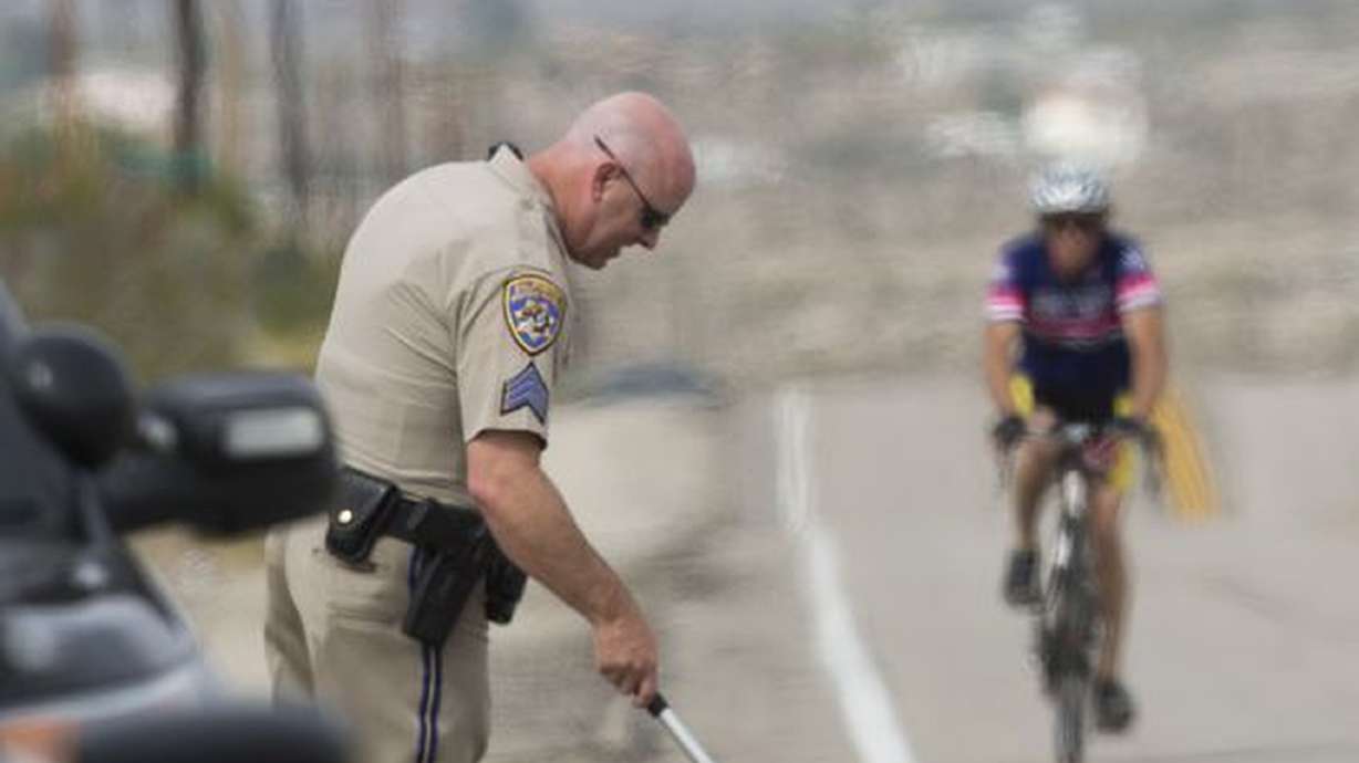 Driver charged in cyclist's death had suspended license