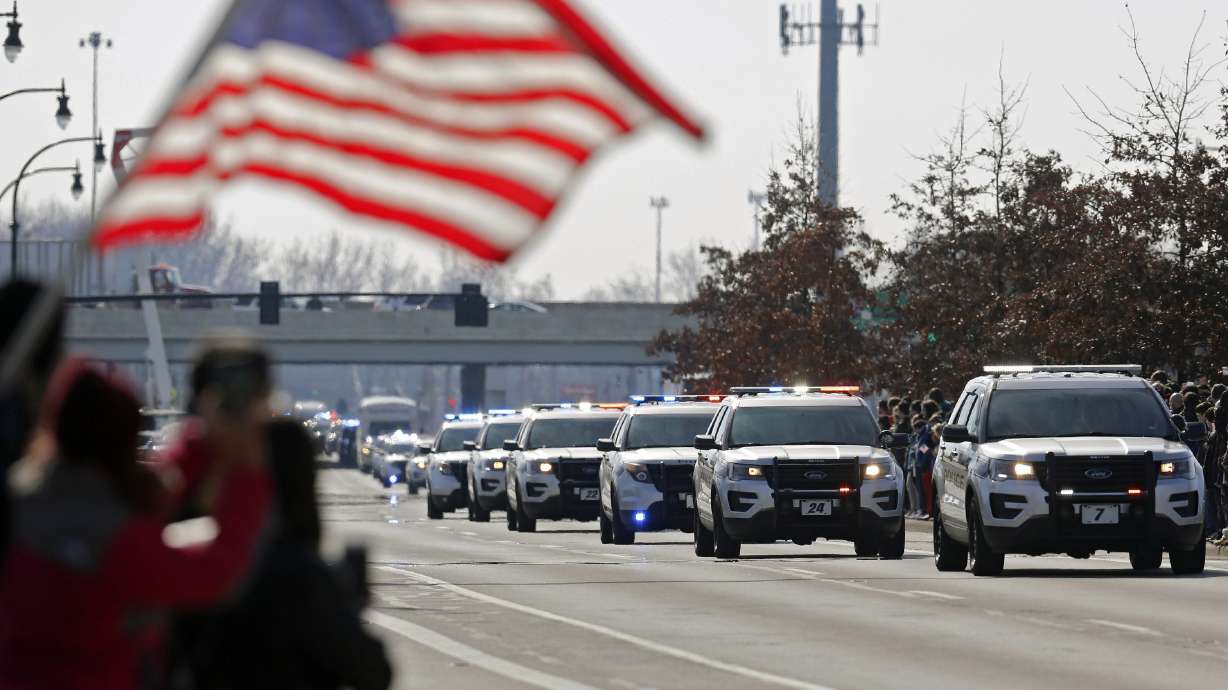 The Latest: Funerals for slain Ohio officers set for Friday