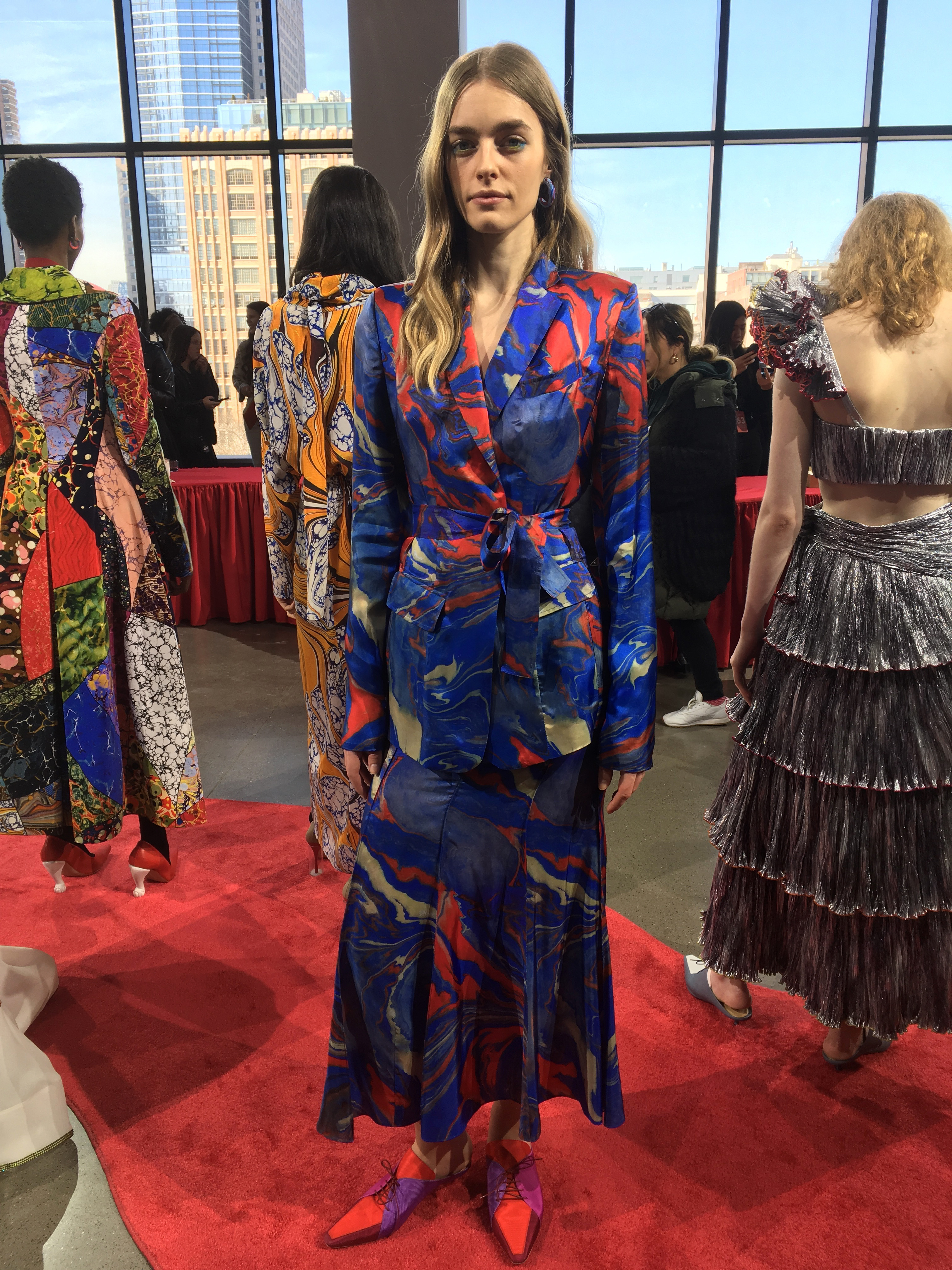 On a massive bed of popcorn, Raf Simons re-examines America