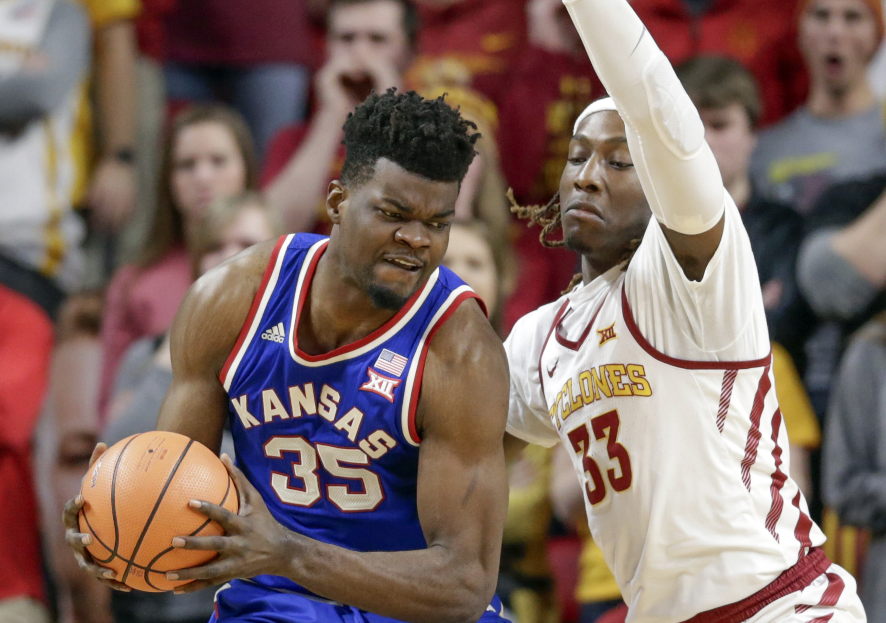 No. 13 Kansas holds off Iowa State 83-77