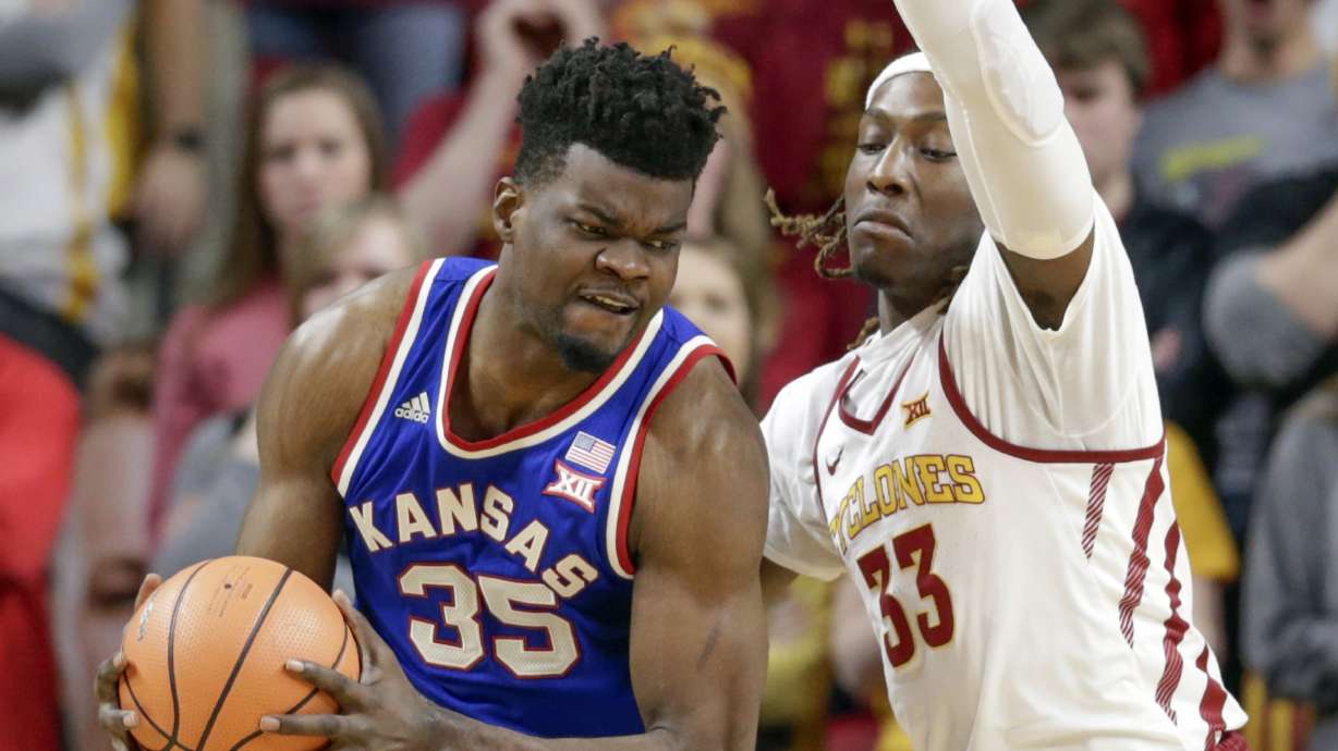 No. 13 Kansas holds off Iowa State 83-77