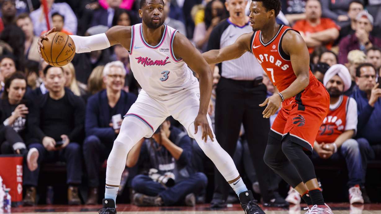 DeRozan scores 27, Raptors hold off Heat 115-112