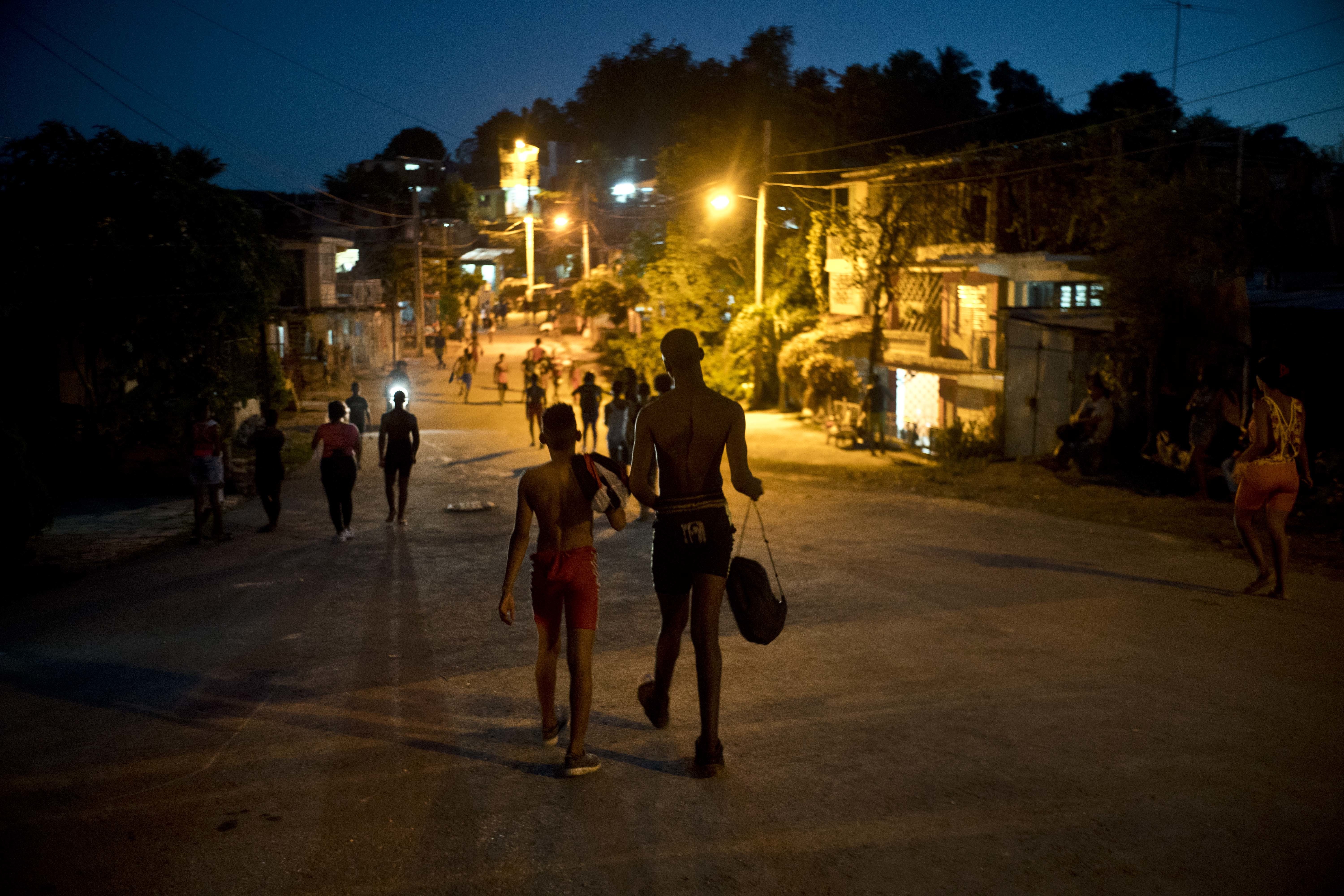 AP PHOTOS: Cuban conductor's homemade wrestling competition