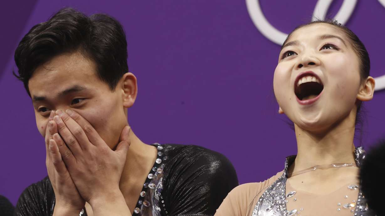 Chinese take slim lead on Russians after pairs short program